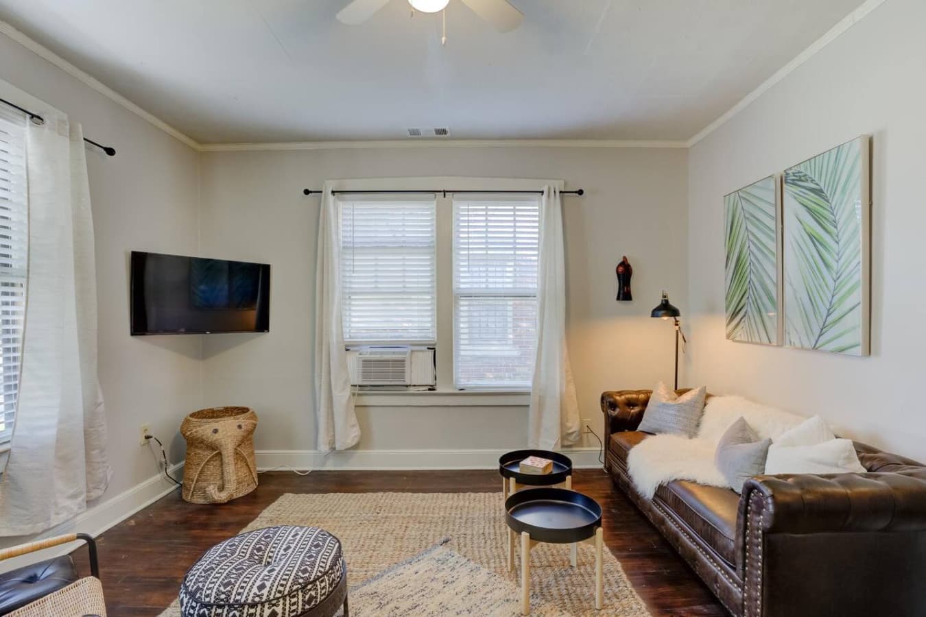 Sofa so inviting it might steal your evening plans—smart TV included.