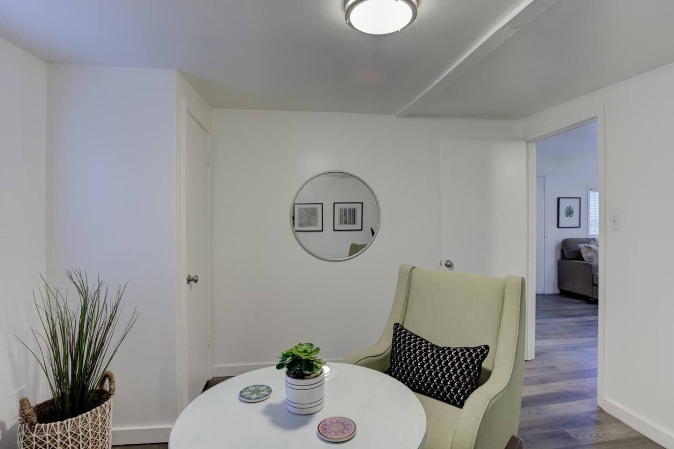 An inviting corner made for cozy chats or solo relaxation.