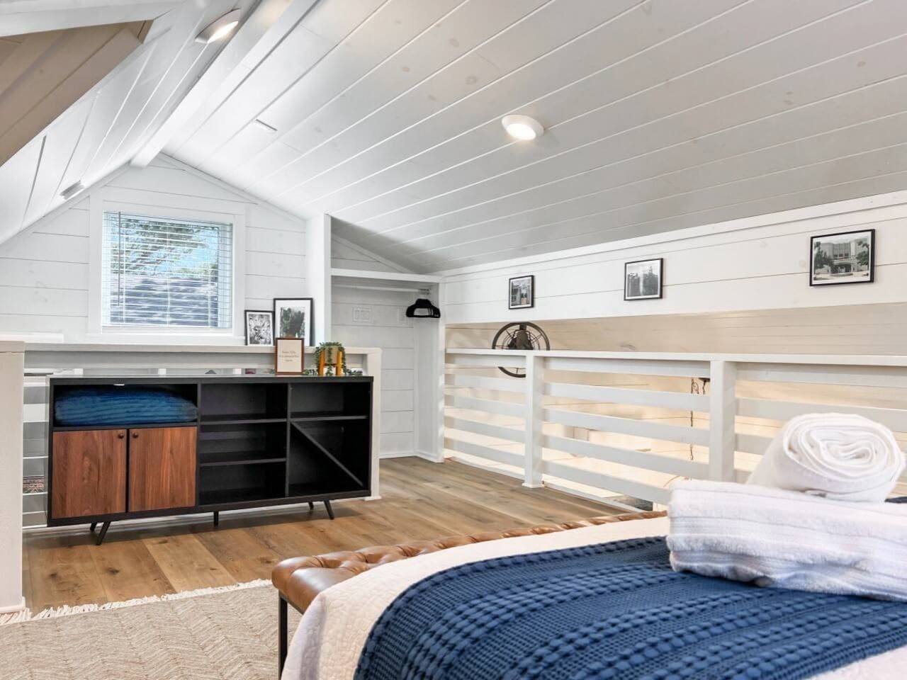 The upstairs queen loft gives guests a tucked-away place to recharge.