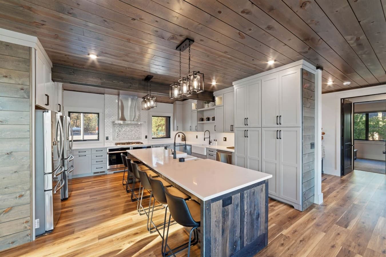 2 Fridges, 3 Dish Washer, 2 Ovens, 36" Range Top and 90SF pantry storage space.