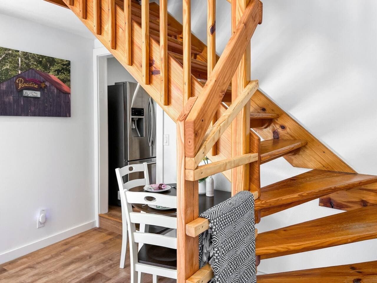 Up this architectural gem of a staircase is the loft suite.