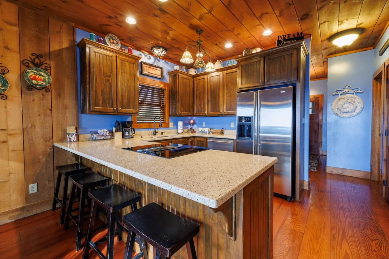 Well Stocked Kitchen with Stainless Steel Appliances. 
VIEWS while cooking!
Kitchen Island Seats 4.