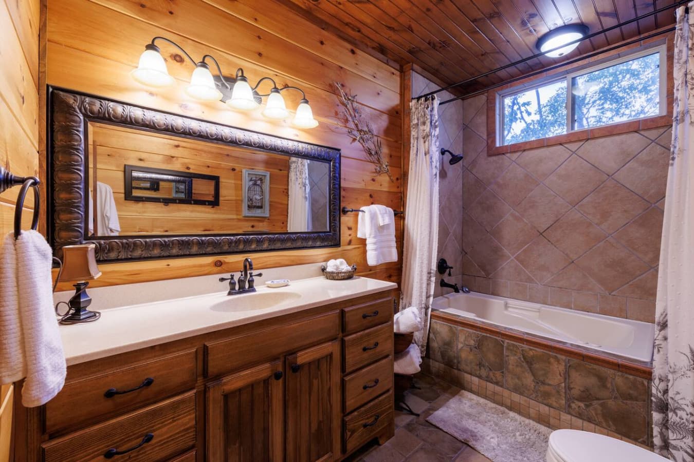 BATHROOM 2: Upstairs full bath near Bedroom 2.