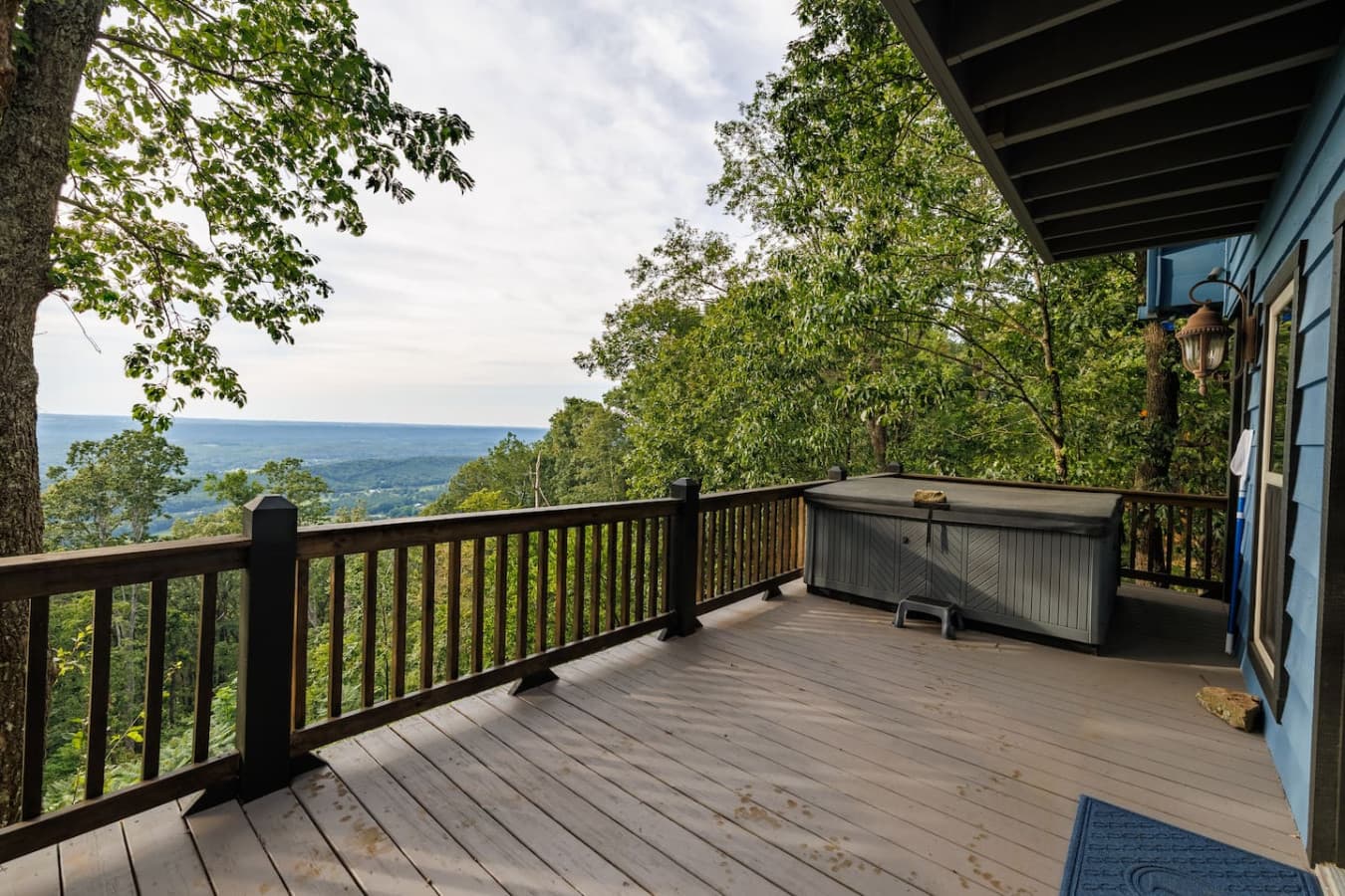 Lower back deck with hot tub.