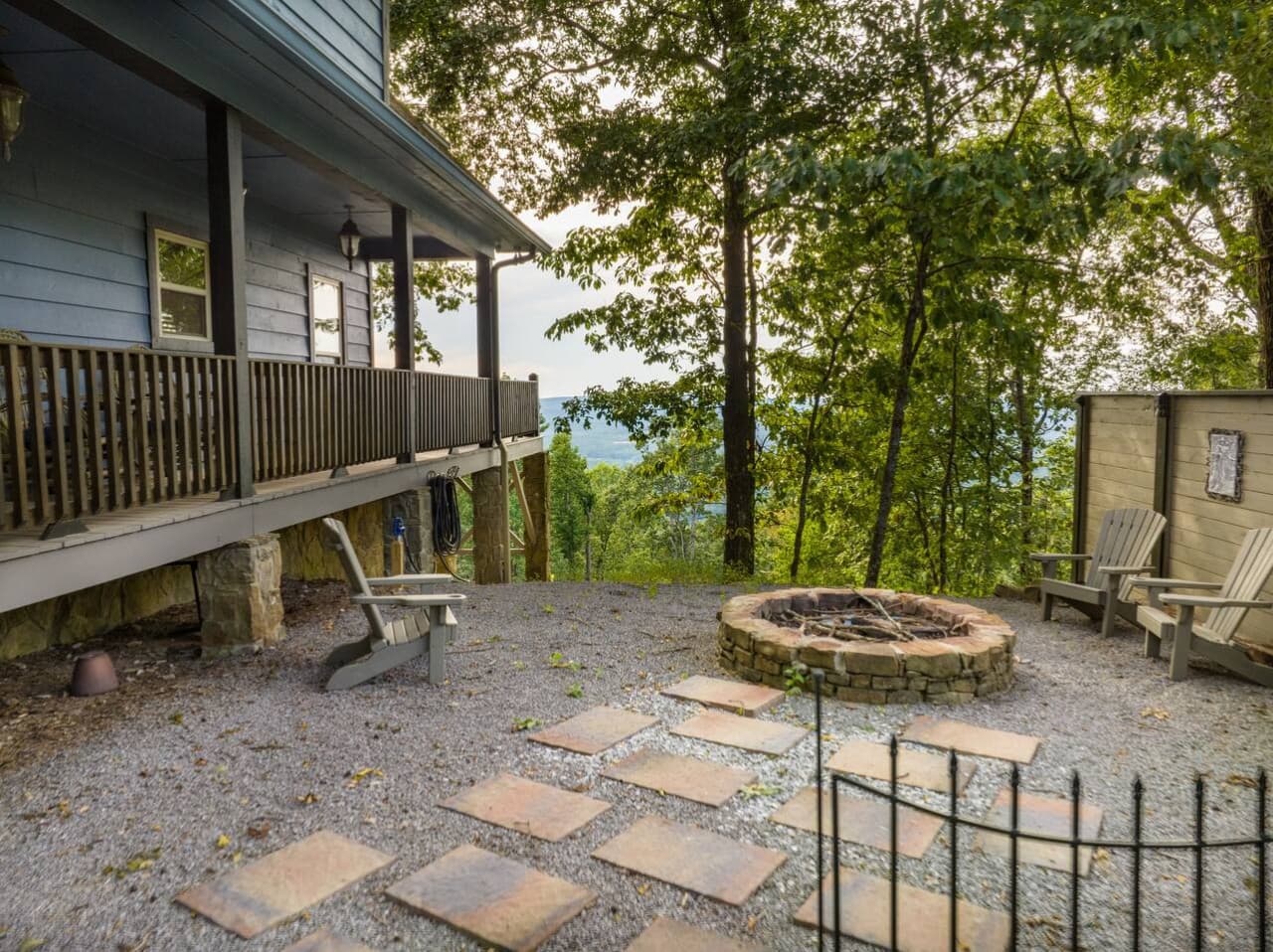 Fire Pit Area Located To The Right of The Home. VIEWS!
Fire Wood Provided.