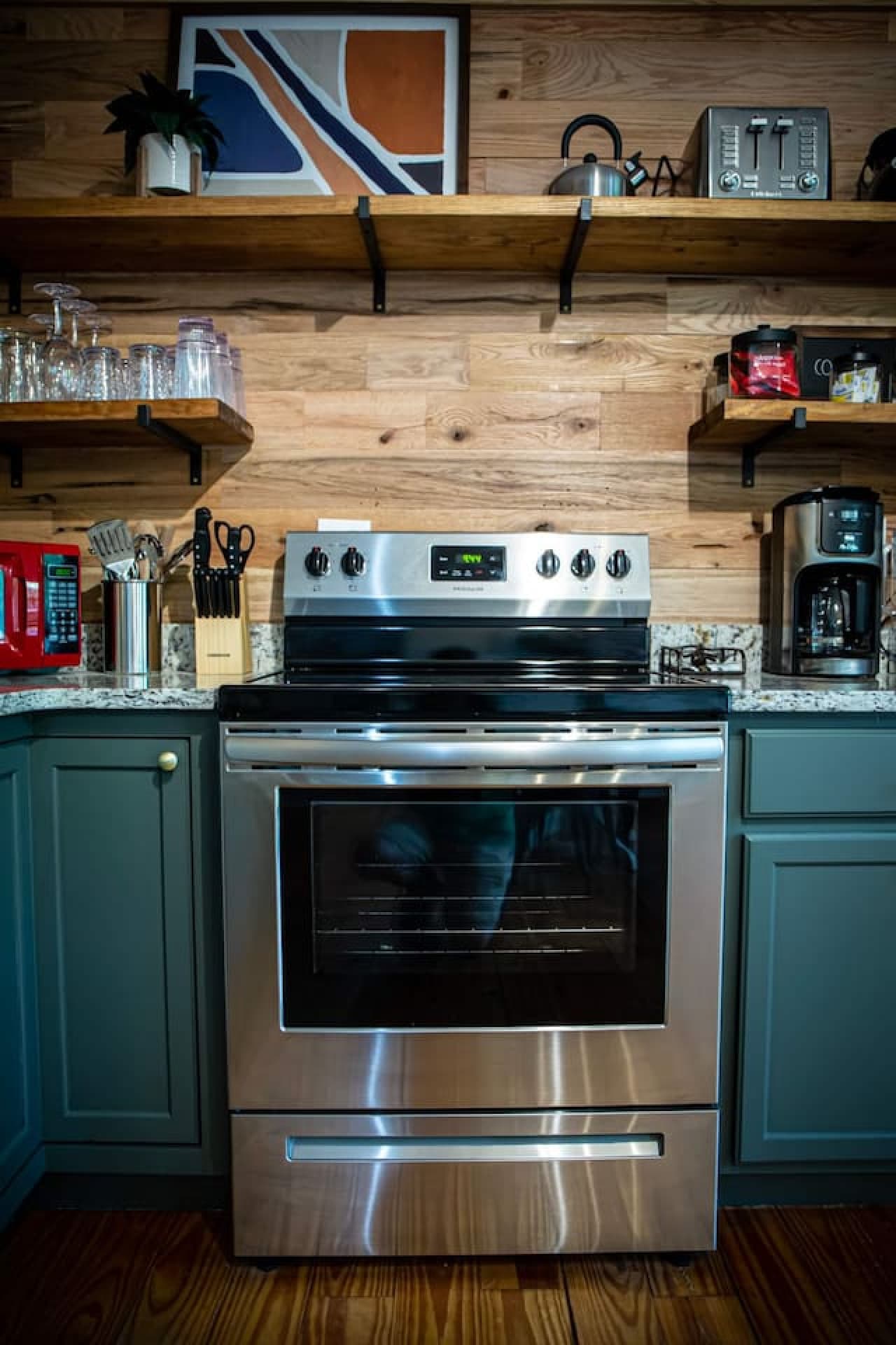 Cook up a meal with the electric stove and oven in the kitchen!