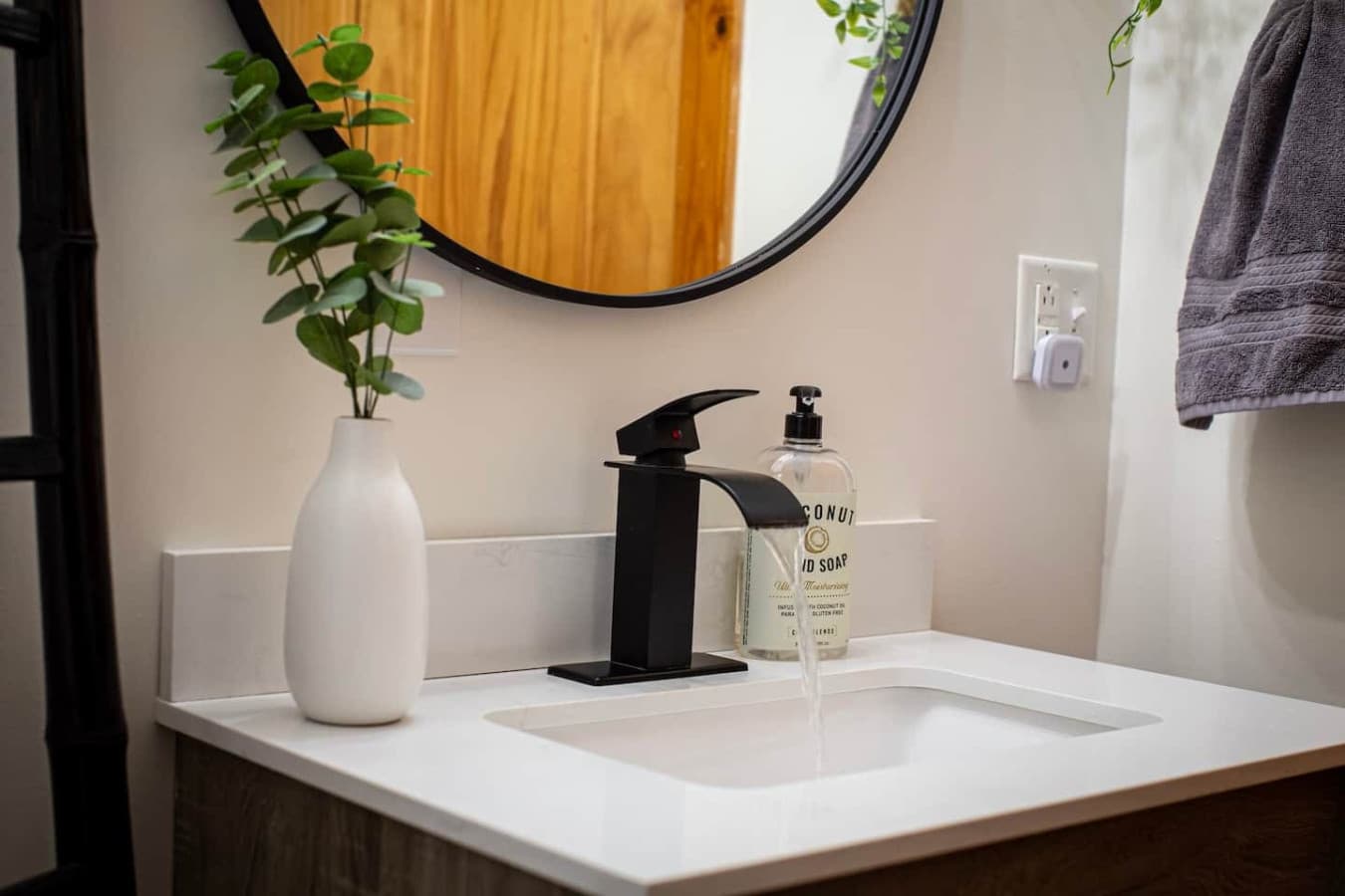 The bathroom sink with essentials provided.