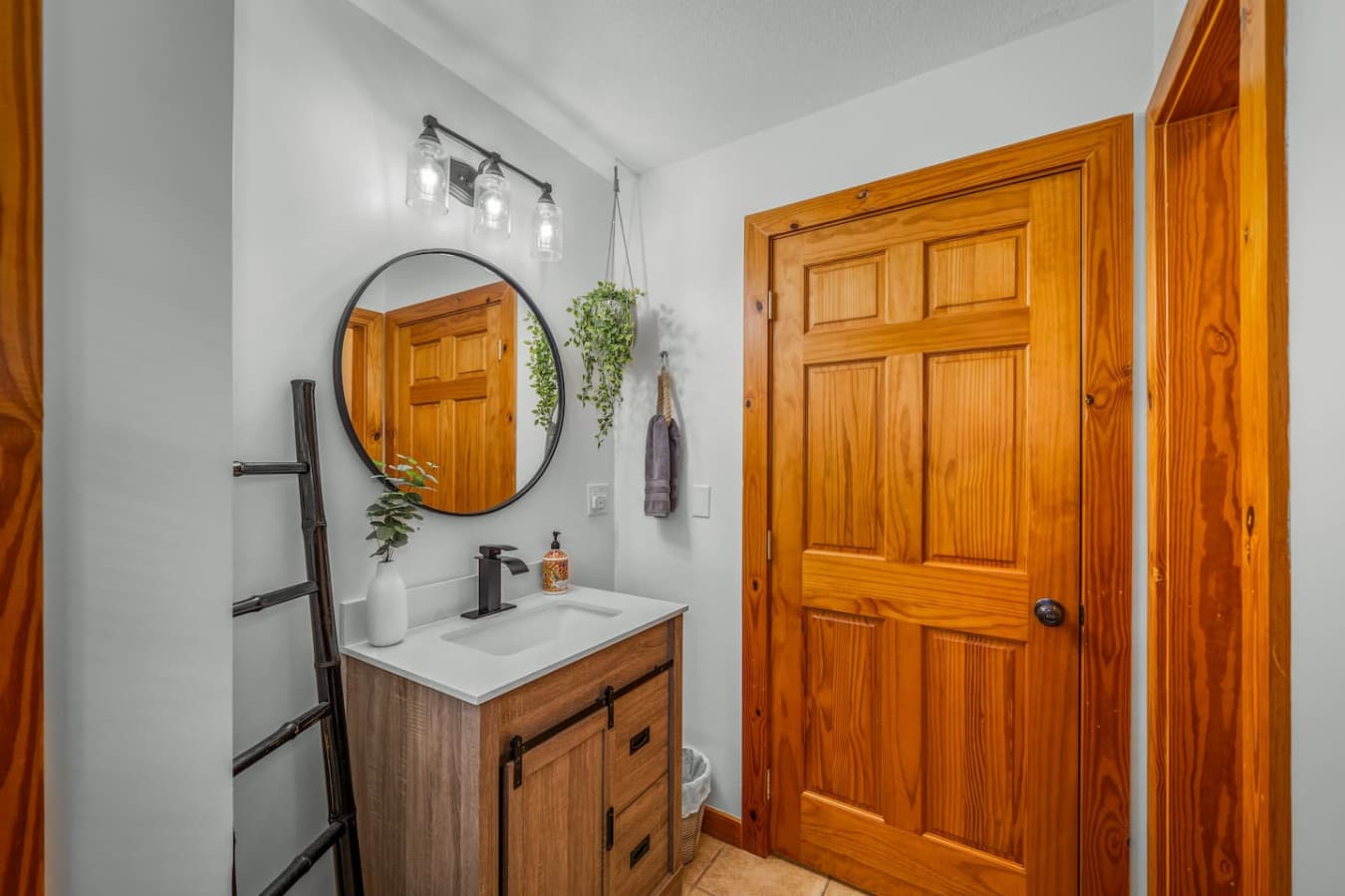 Half bathroom with a convenient toilet closet for added privacy.