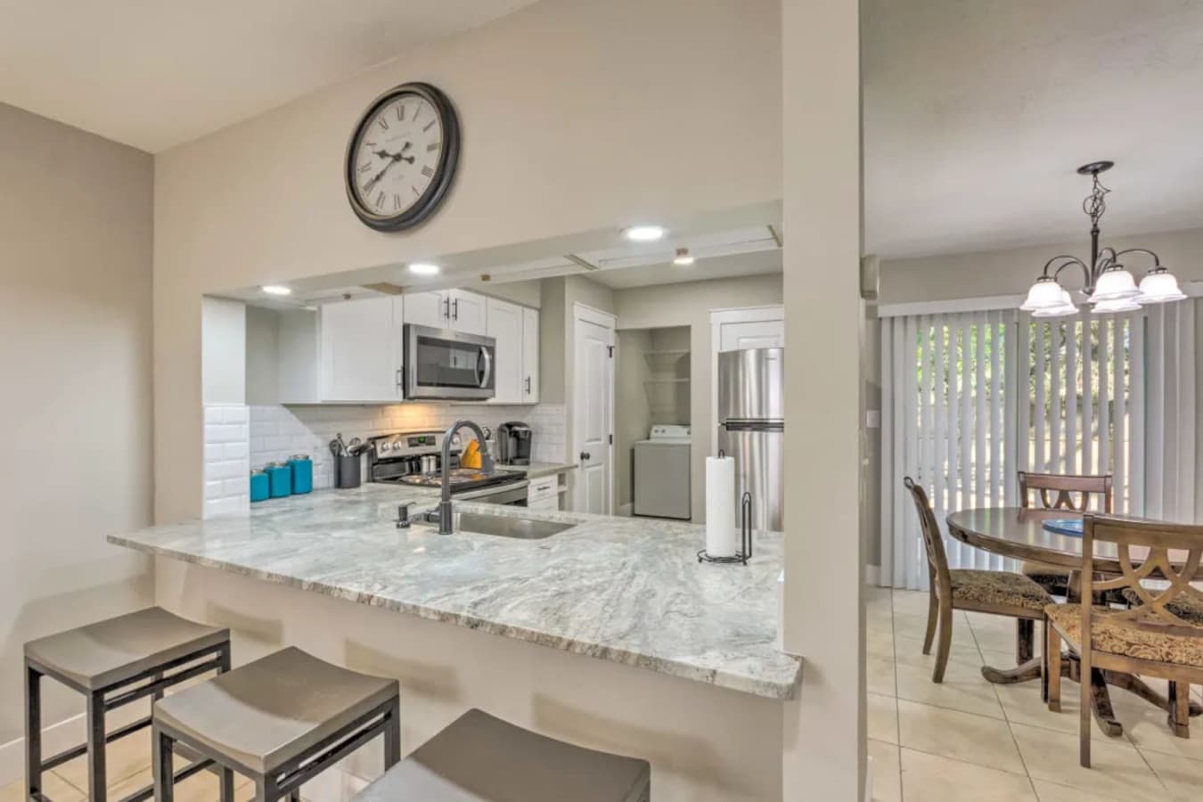 Dine in comfort and style! This spacious dining area is perfect for enjoying meals and making memories with loved ones.