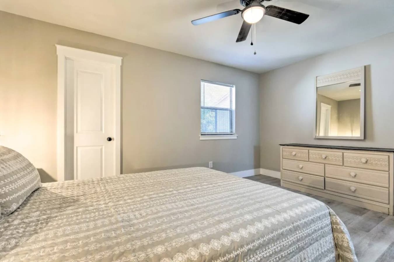 A bright and inviting space with a plush queen bed for ultimate comfort.
