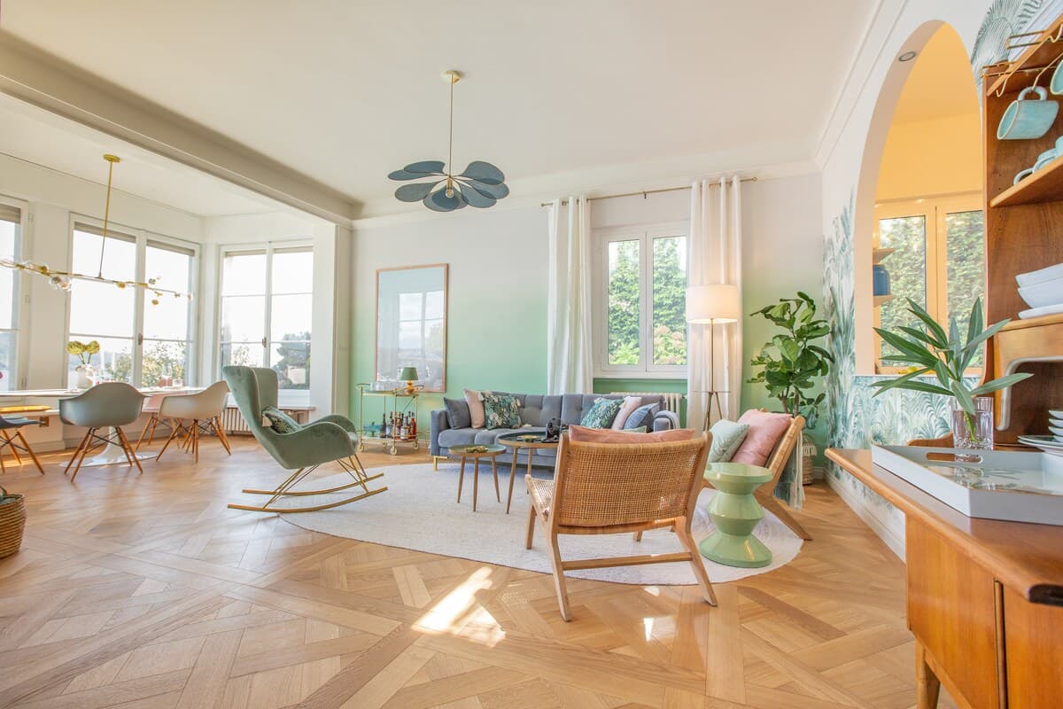 Living room and dining area with lake view