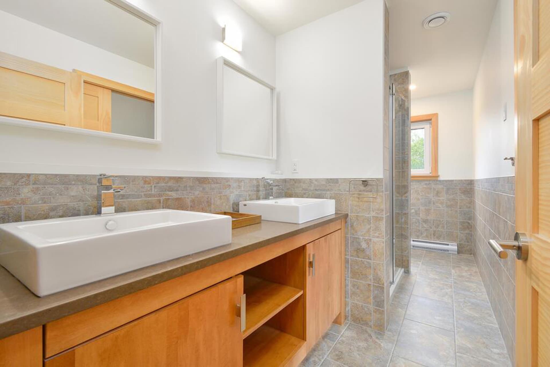 King suite with double vanity and walk-in shower (second floor)