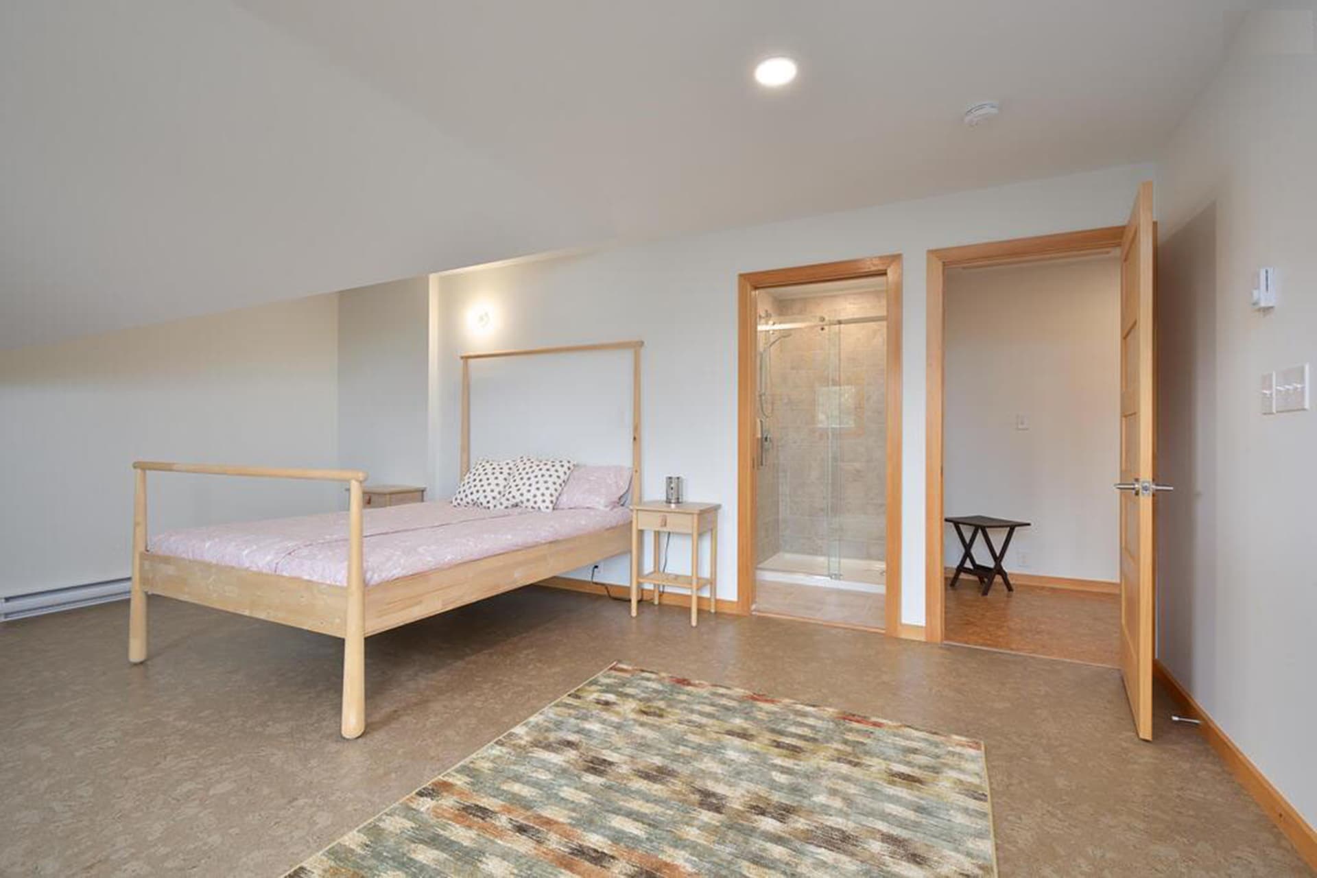 Queen suite with vanity and walk-in shower (second floor)