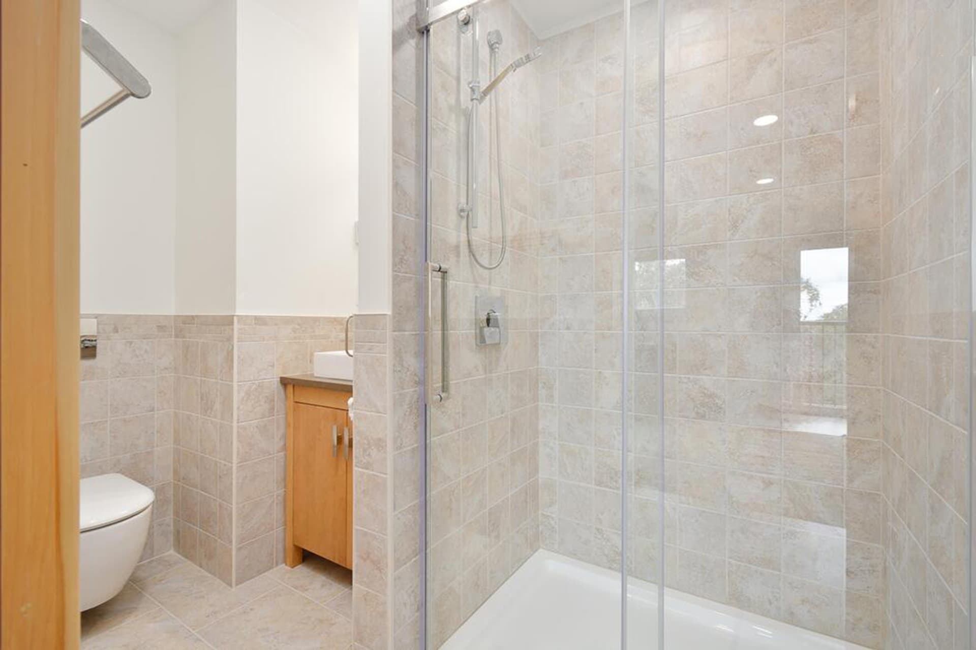 Queen suite with vanity and walk-in shower (second floor)