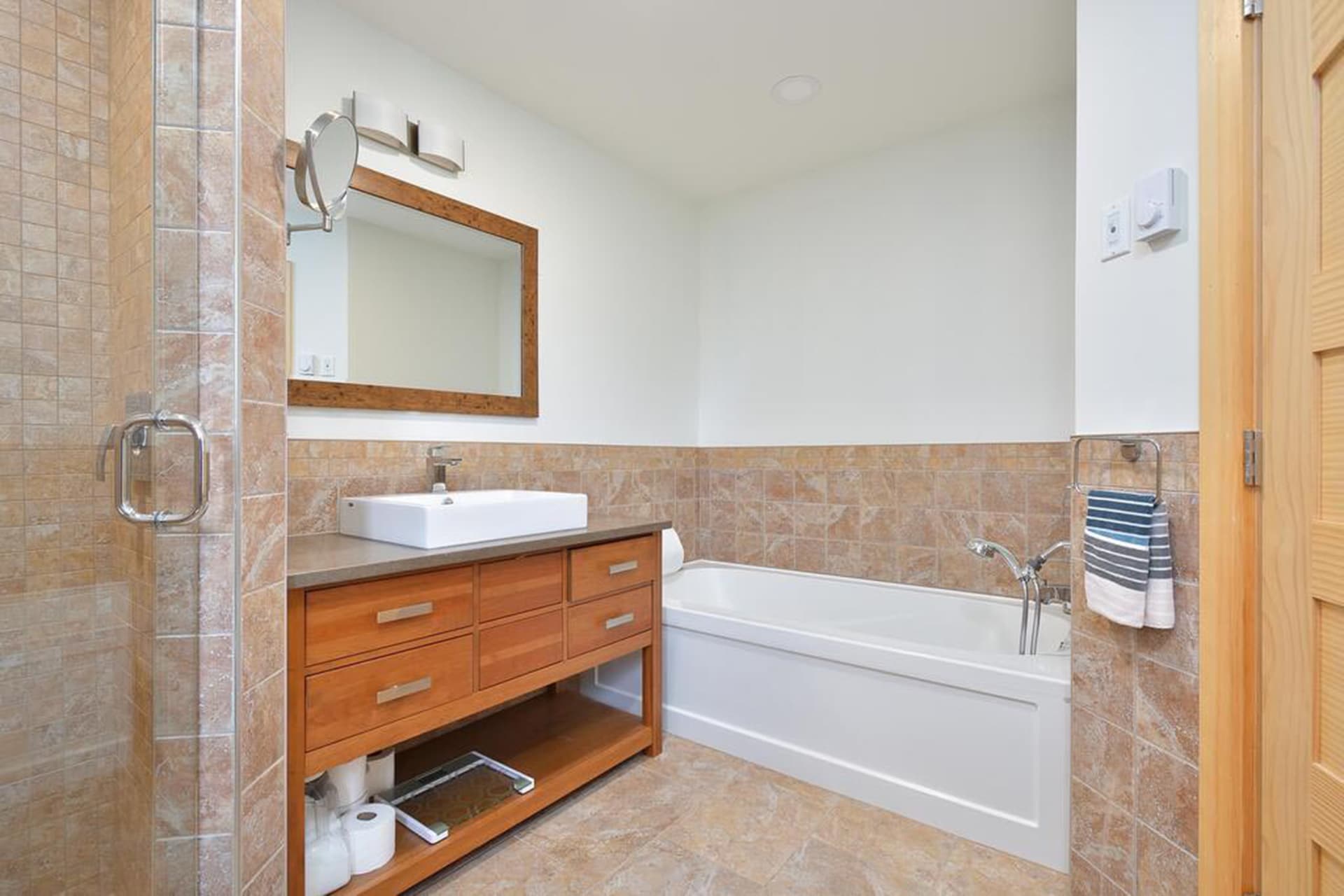 Master suite with walk-in closet, vanity, bidet, soaking tub and walk-in shower (on main floor)