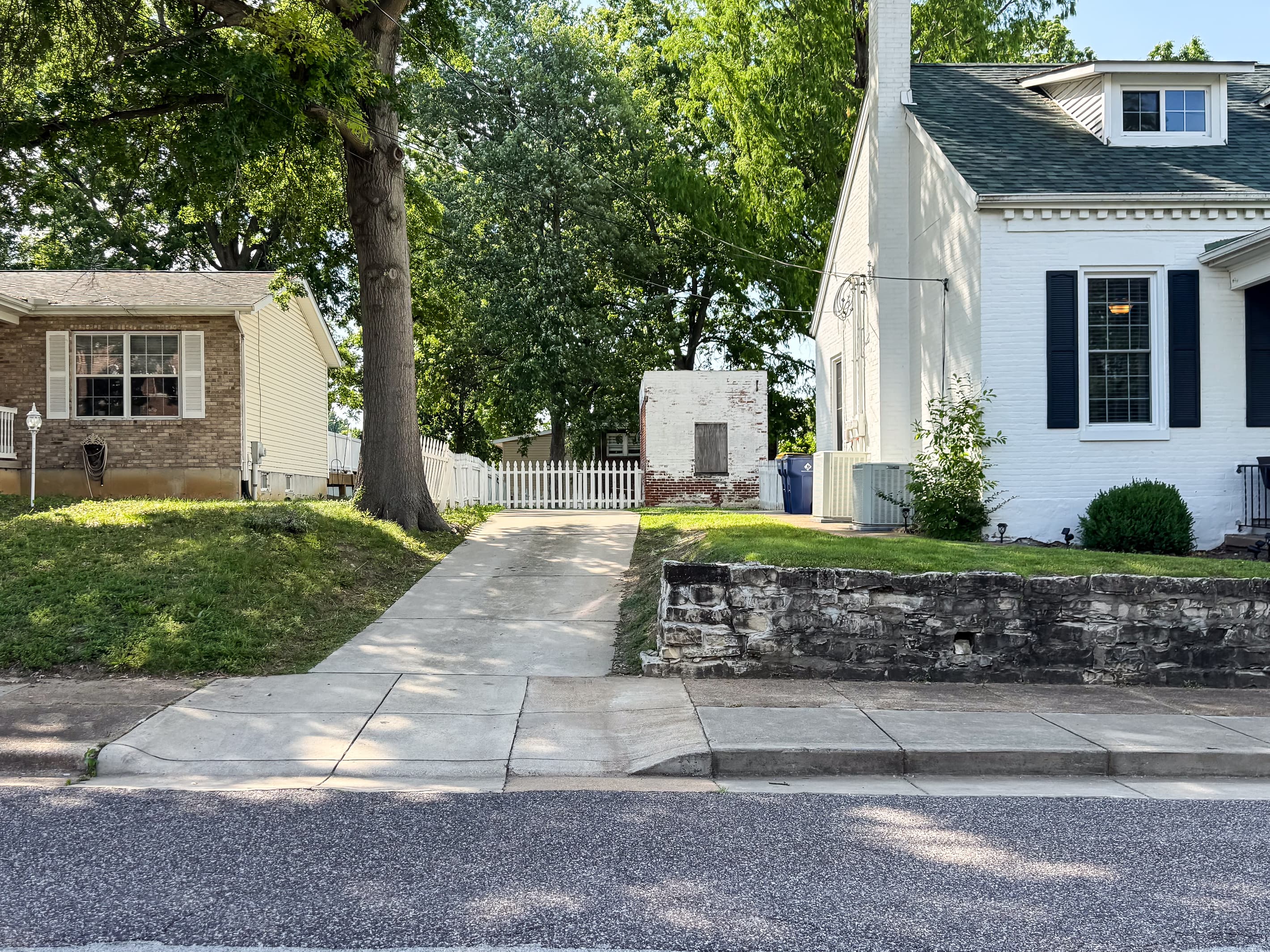 Over a century old, the home has been updated to modern conveniences, with a private drive to the back entrance thru the white picket fence and a charming front porch to watch the sunrise with a cup of coffee or a cocktail in the evening at Aussie Cottage.