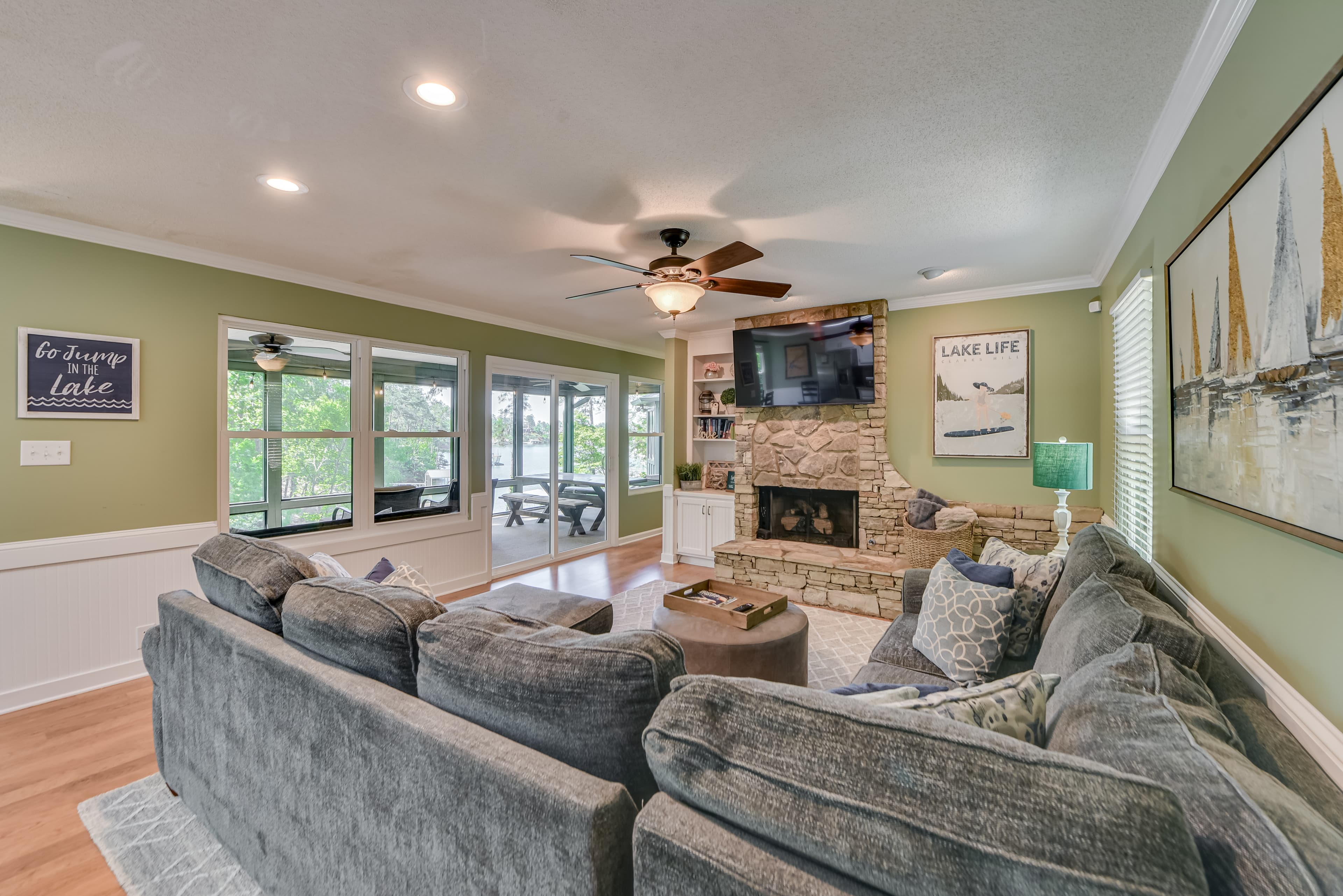 Cozy Living Area with Gorgeous Lake Views & Gas Fireplace
