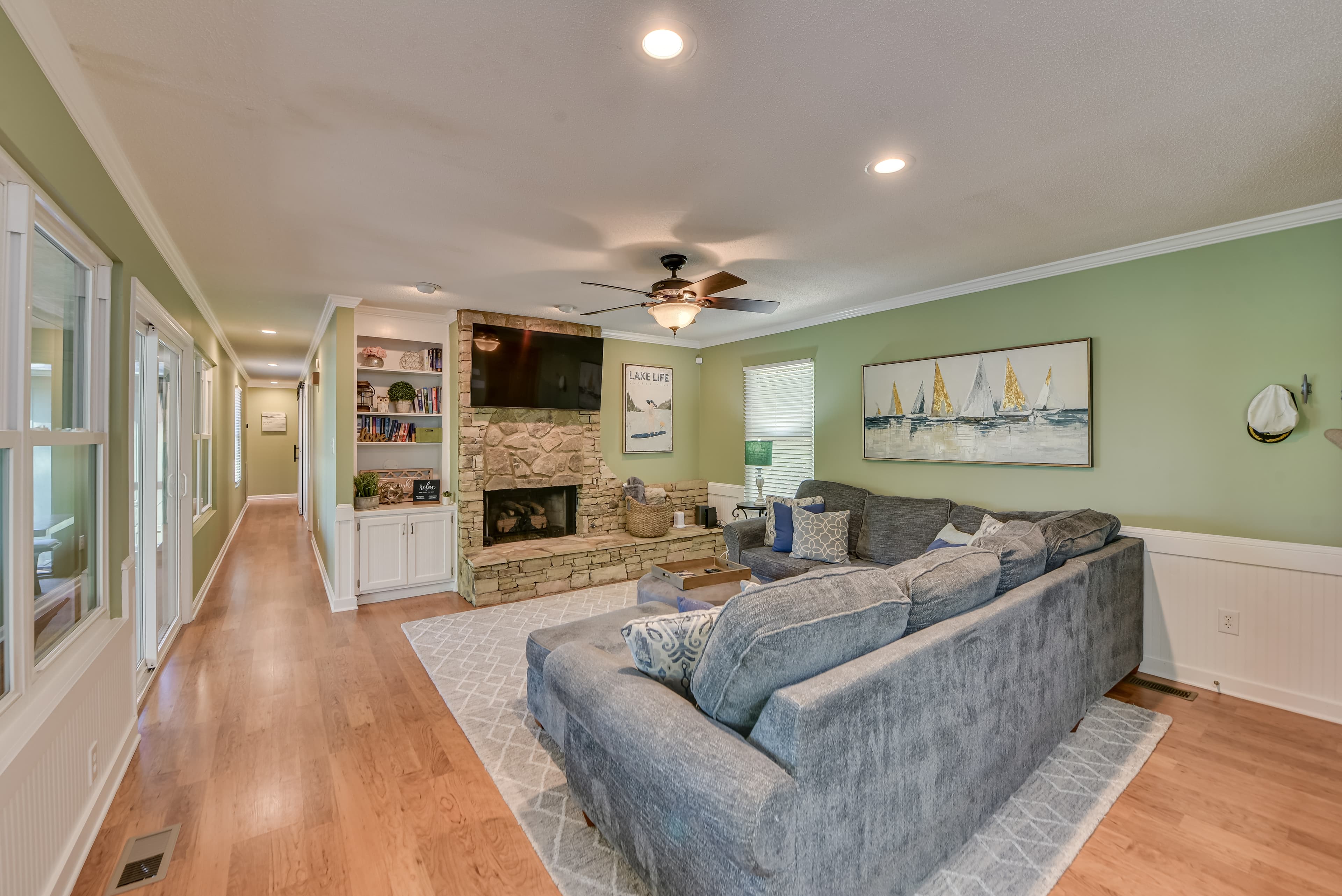 Cozy Living Area with Gorgeous Lake Views & Gas Fireplace