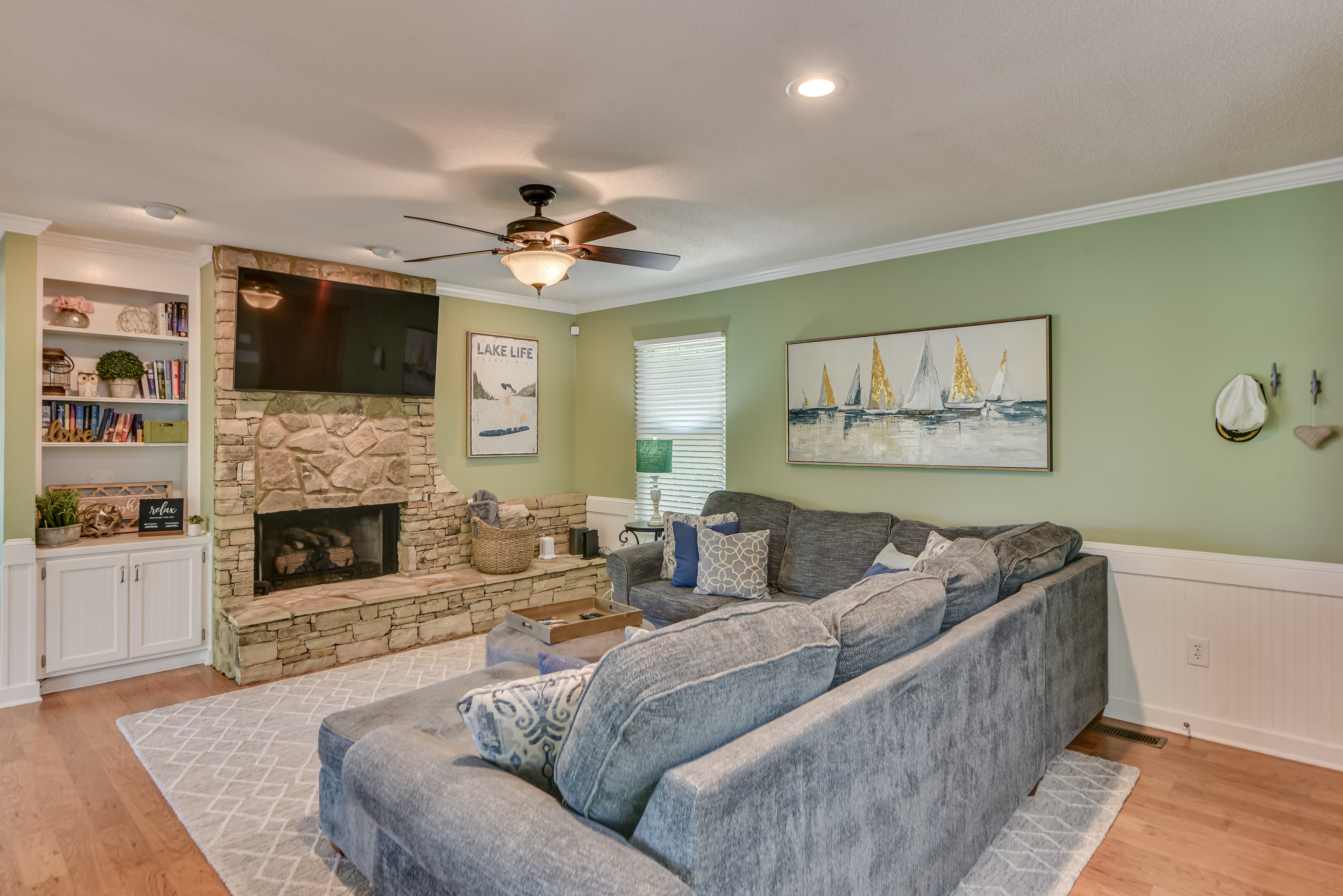 Cozy Living Area with Gorgeous Lake Views & Gas Fireplace
