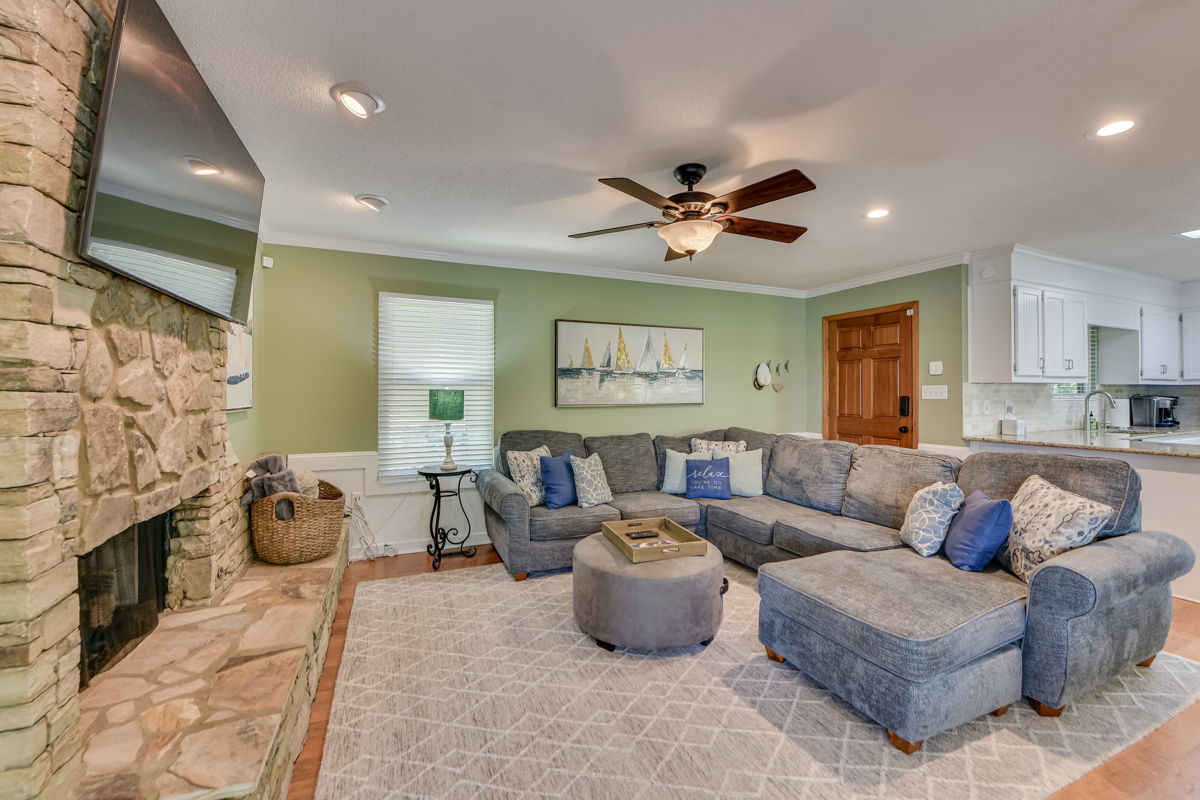 Cozy Living Area with Gorgeous Lake Views & Gas Fireplace