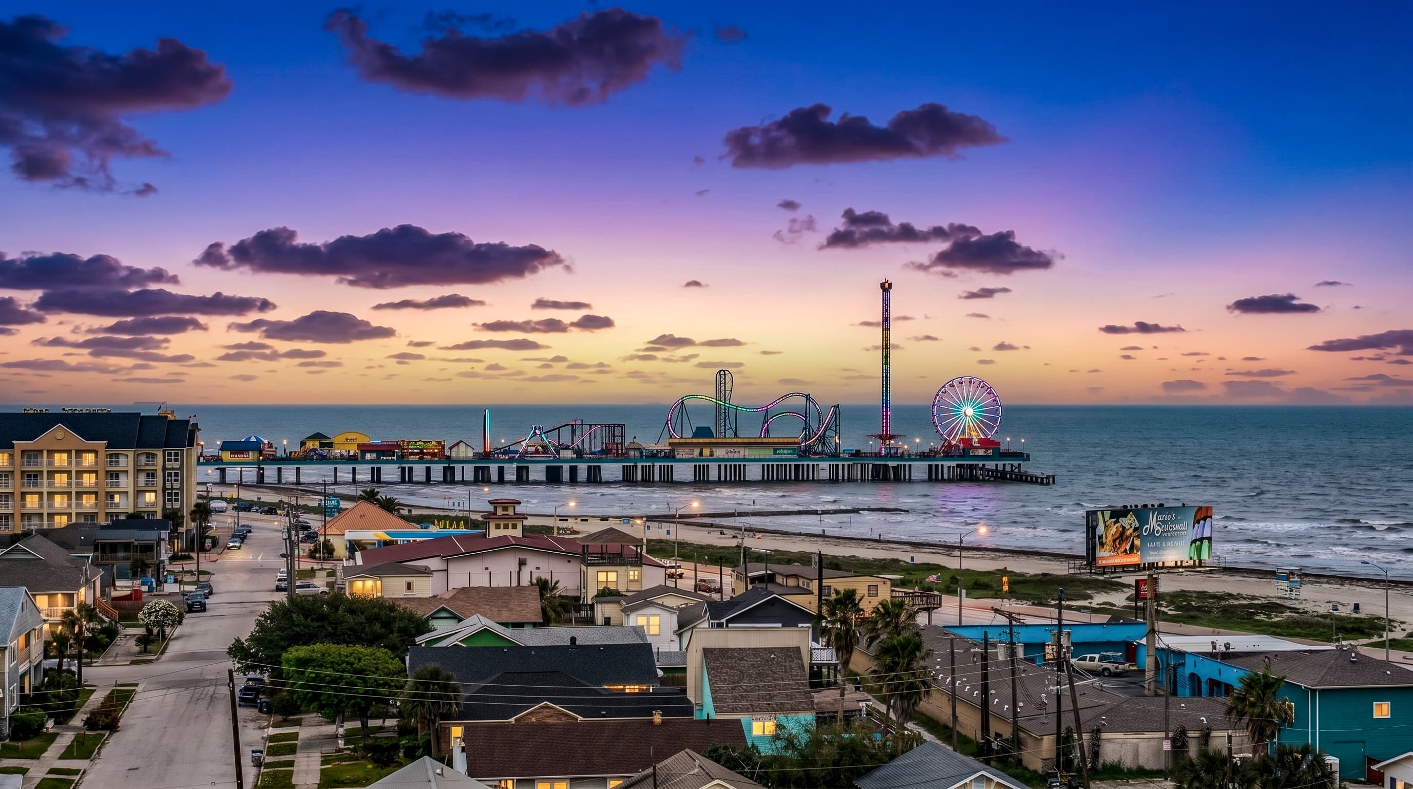 Pleasure Pier — Ferris wheel, roller coasters, and the Gulf of Mexico — is steps from The Lookout at R½. Arrive and never need your car for the whole trip.
