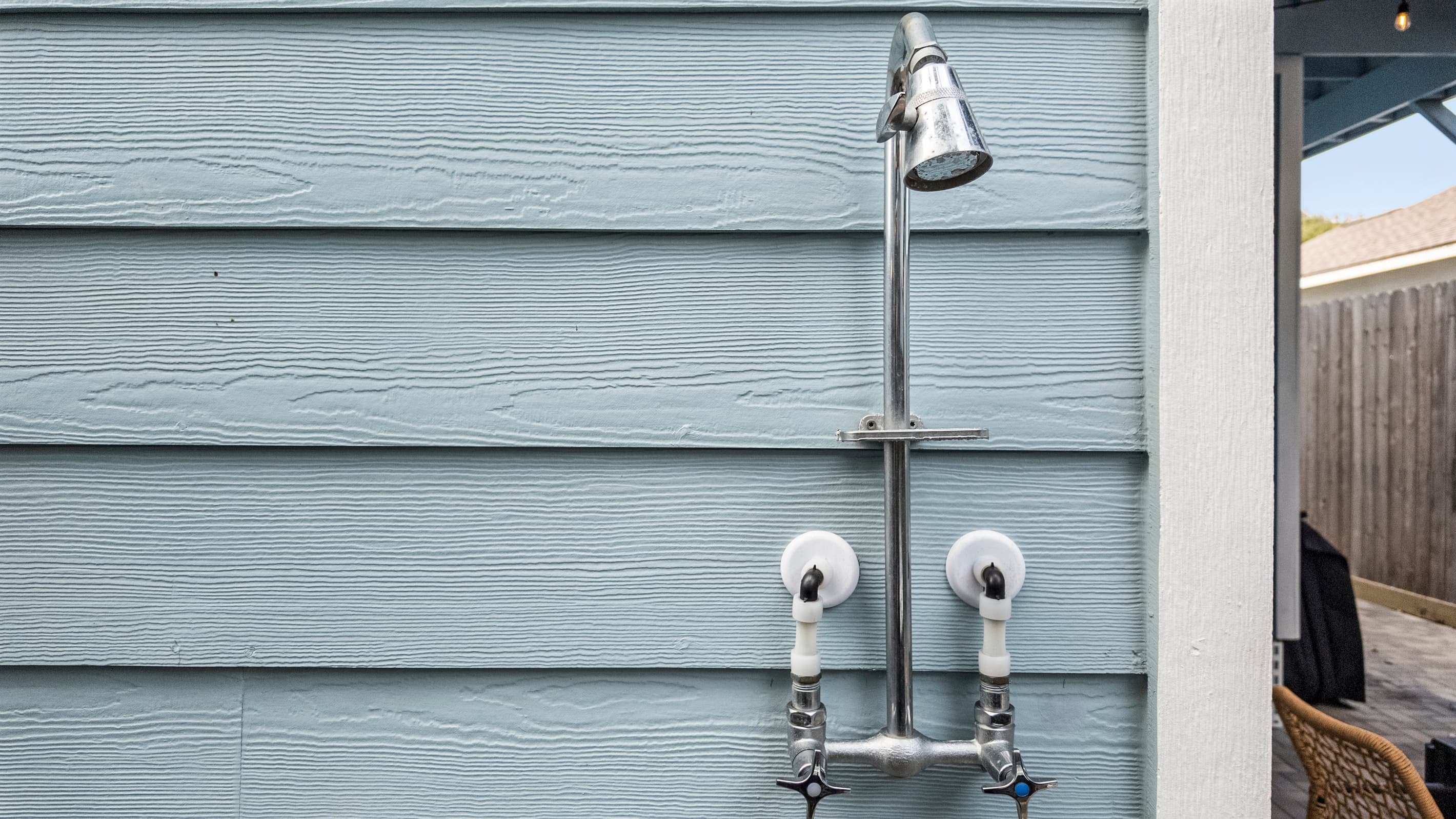 Outdoor shower at The Lookout at R½ — rinse off after the beach, hot tub, or sauna before heading inside. Private, convenient, and right in the courtyard.
