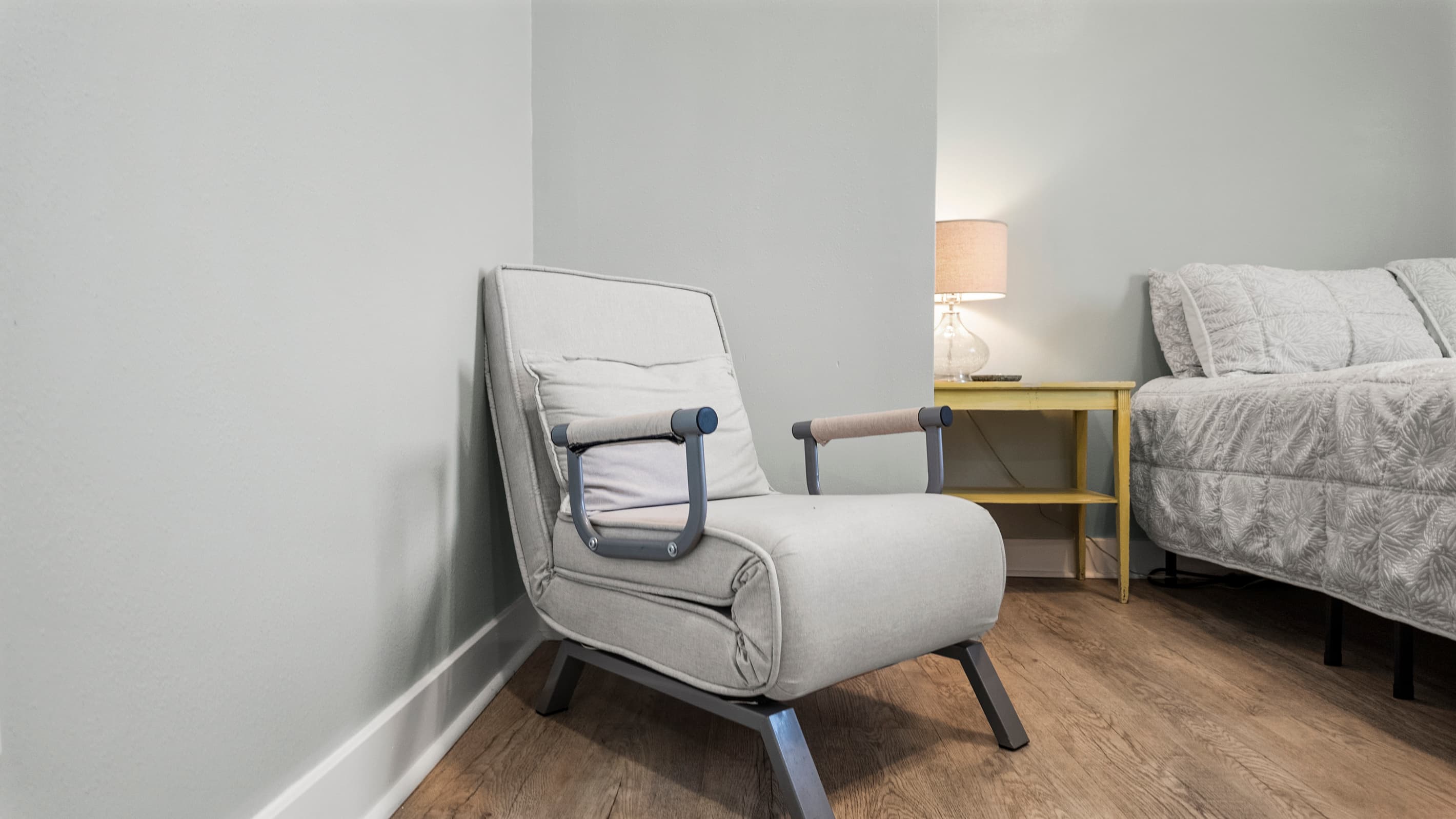 Flexible sleeping at The Lookout at R½ — a convertible sleeper chair accommodates the 5th guest comfortably. Everyone gets a real bed, no one ends up on the floor.
