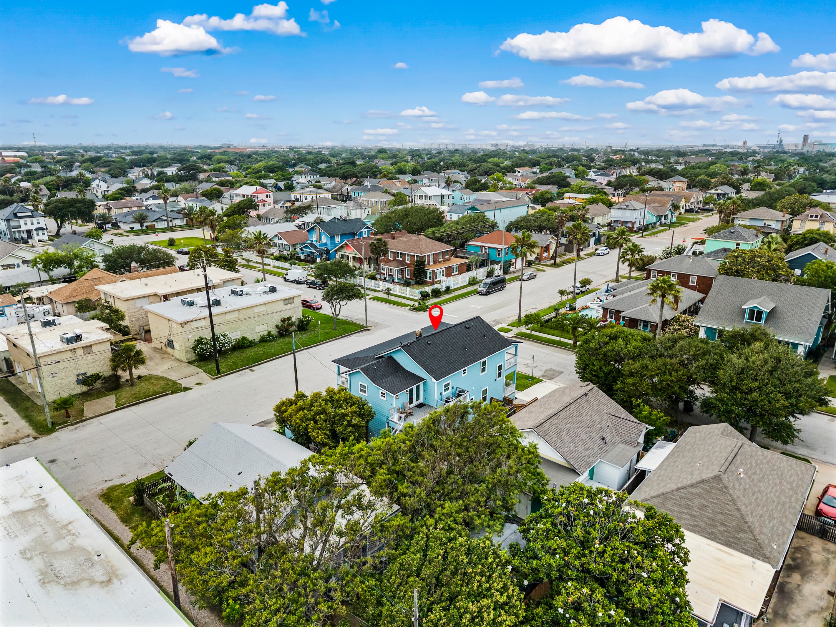 The Lookout at R½ (pinned) tucked into the tree-lined streets of the Galveston Seawall neighborhood — a private retreat in the heart of the island.