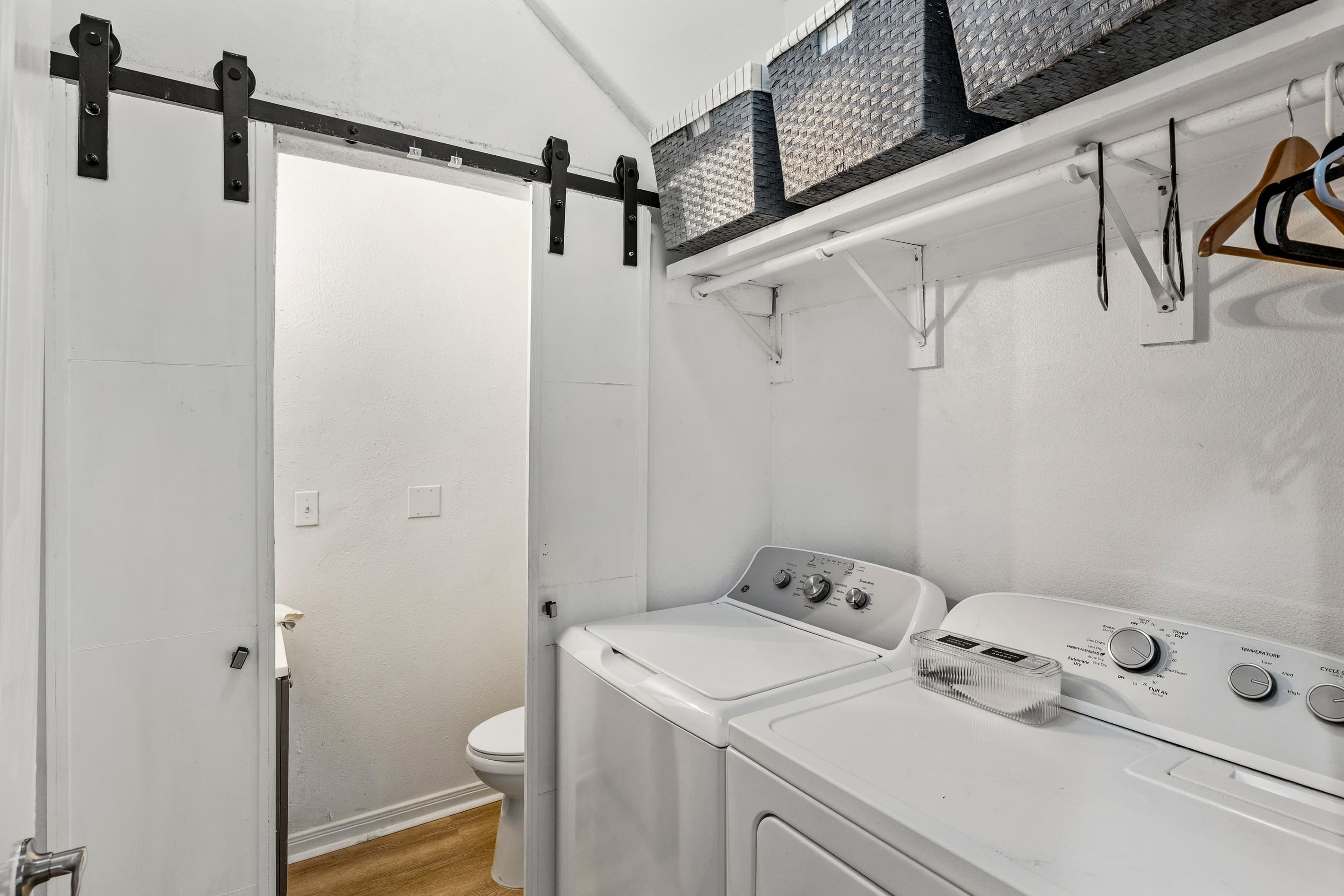 Full-size washer and dryer at Summer Bliss — on the main level with detergent provided. No laundromat runs needed, even on longer stays.