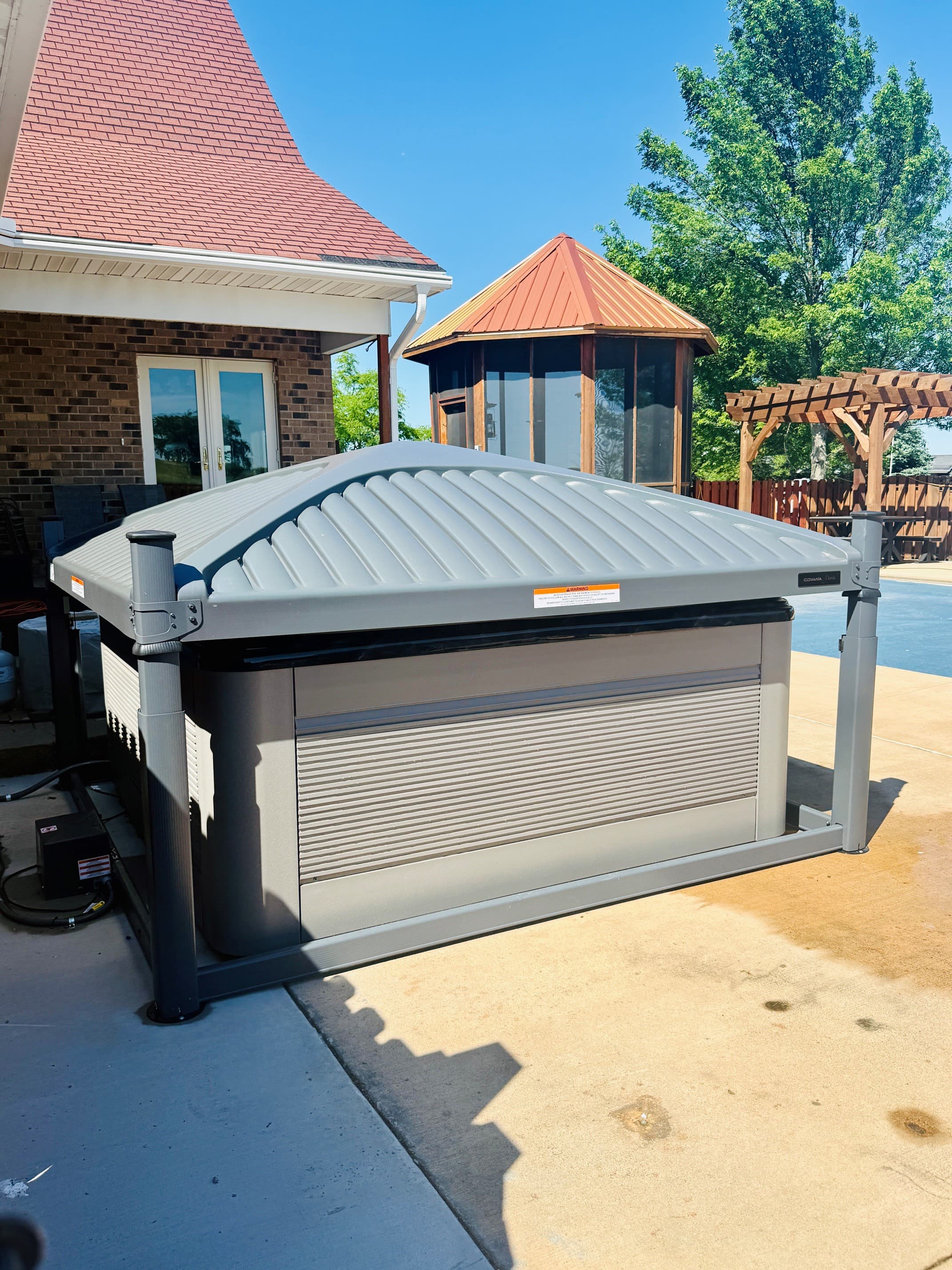 Luxury without the hassle. Our Covana automated hot tub cover opens and closes in seconds with a key