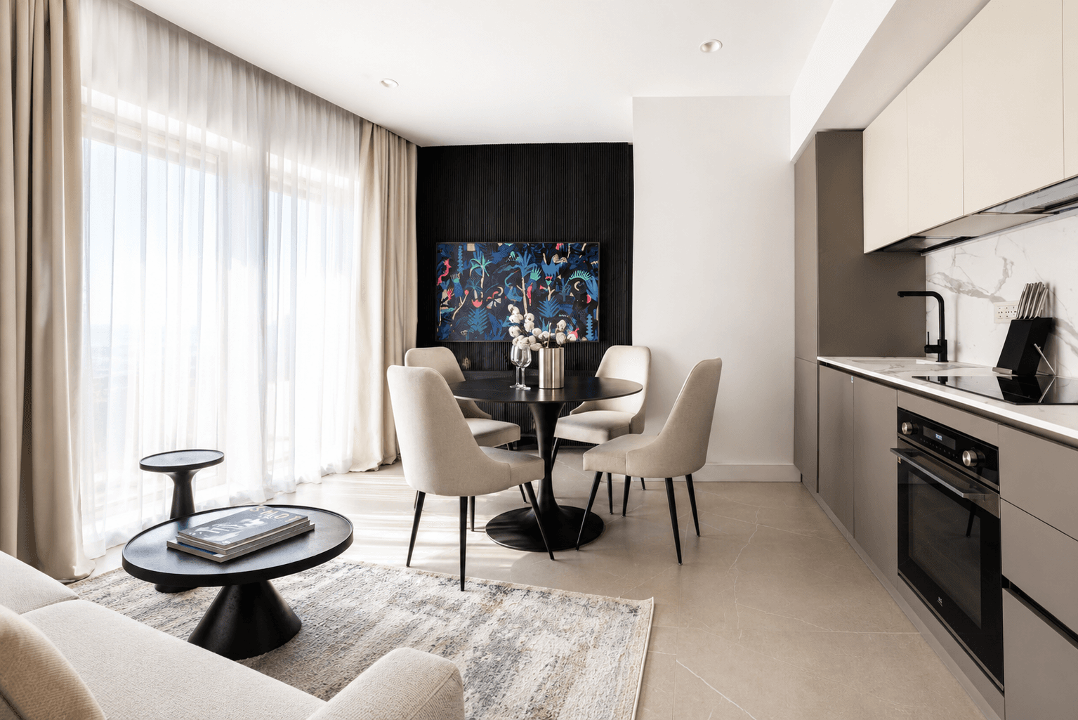 AZULIS DelleTerme Suites Open plan living dining and kitchen with garden view and smart TV by RENTAL
