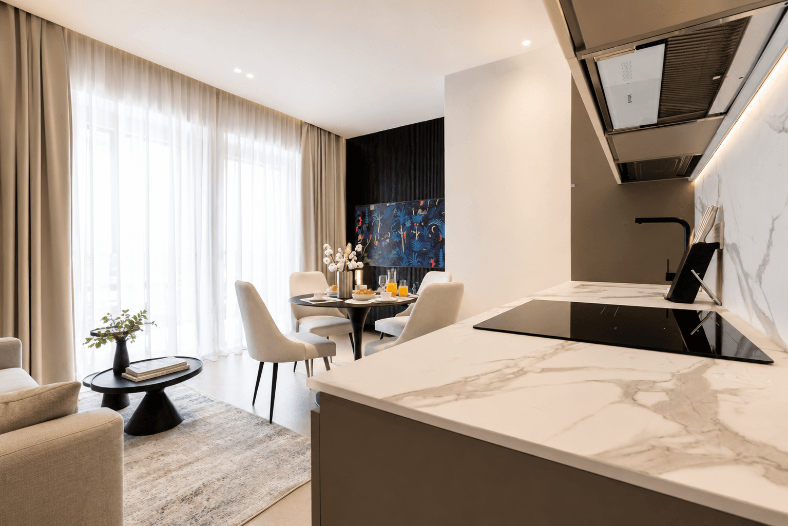 AZULIS DelleTerme Suites Marble kitchen peninsula with induction hob and dining area by RENTAL12