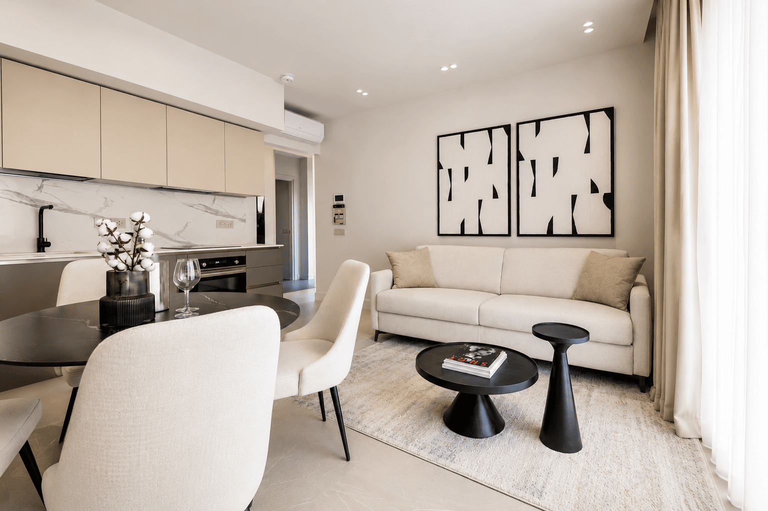 AZULIS DelleTerme Suites Open plan lounge and kitchen with marble finishes by RENTAL12