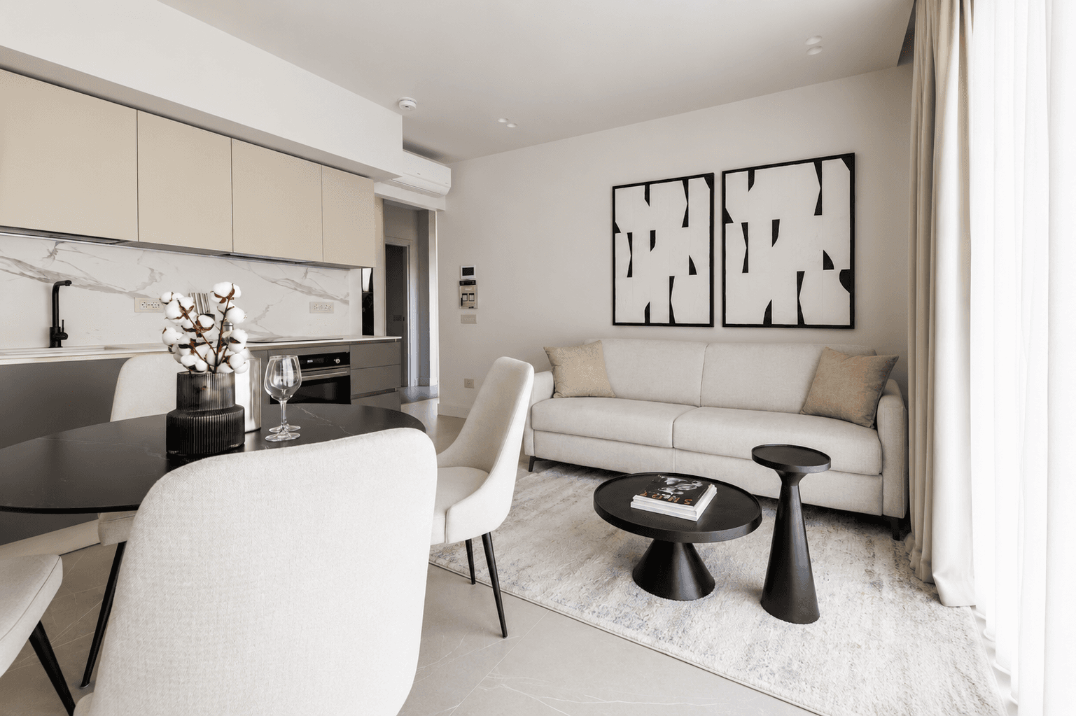AZULIS DelleTerme Suites Open living dining with fitted kitchen and modern art by RENTAL12