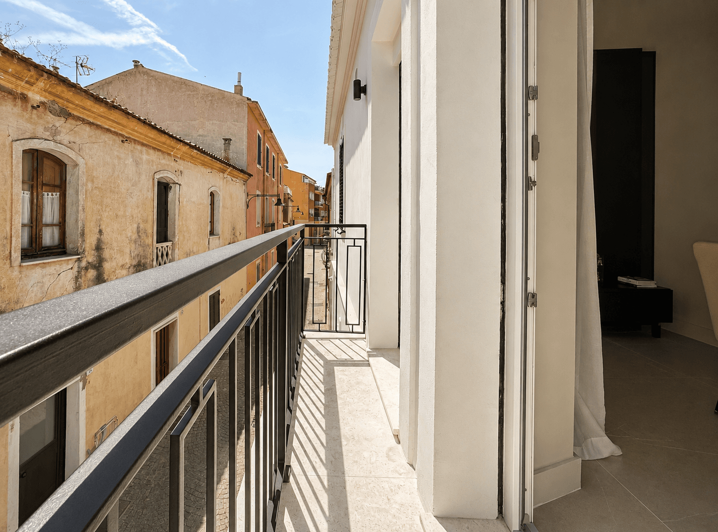 AZULIS DelleTerme Suites French balcony with front street view by RENTAL12