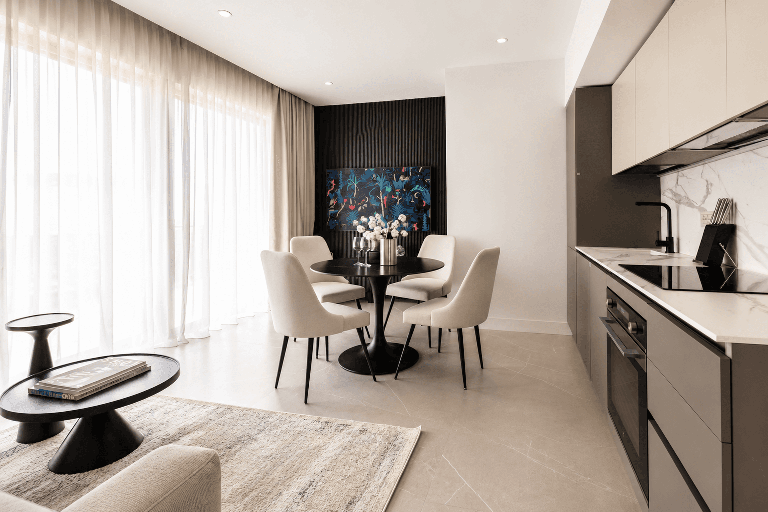 AZULIS DelleTerme Suites Open living room with thin smart TV and dining table by RENTAL12