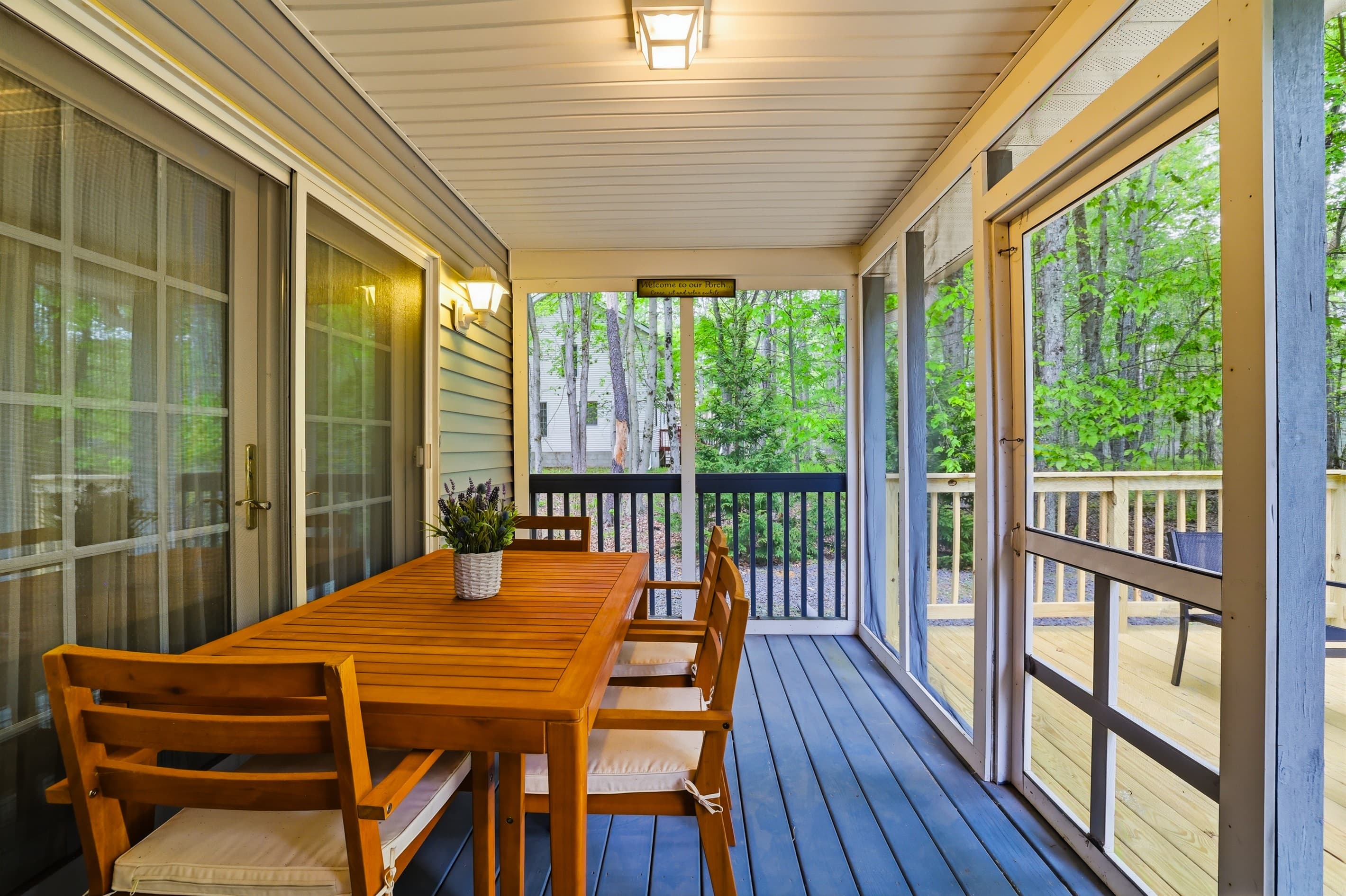 Screened porch in the back of the house