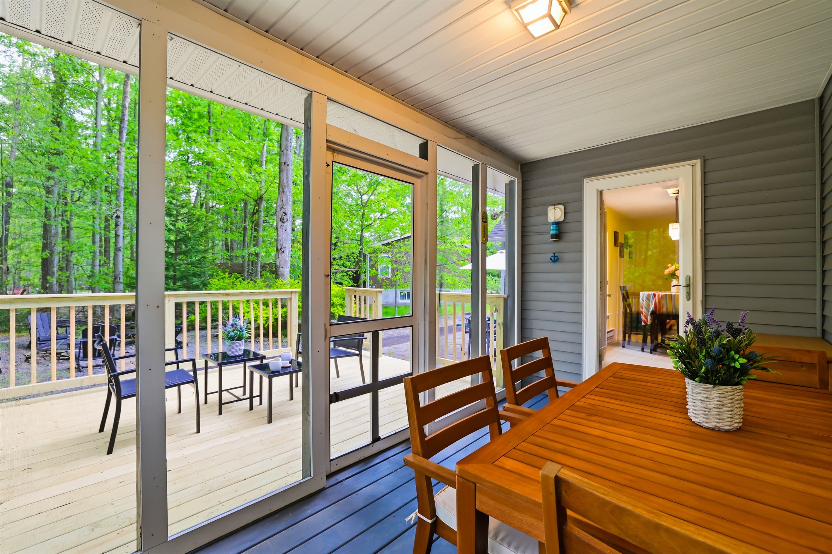 Screened porch in the back of the house