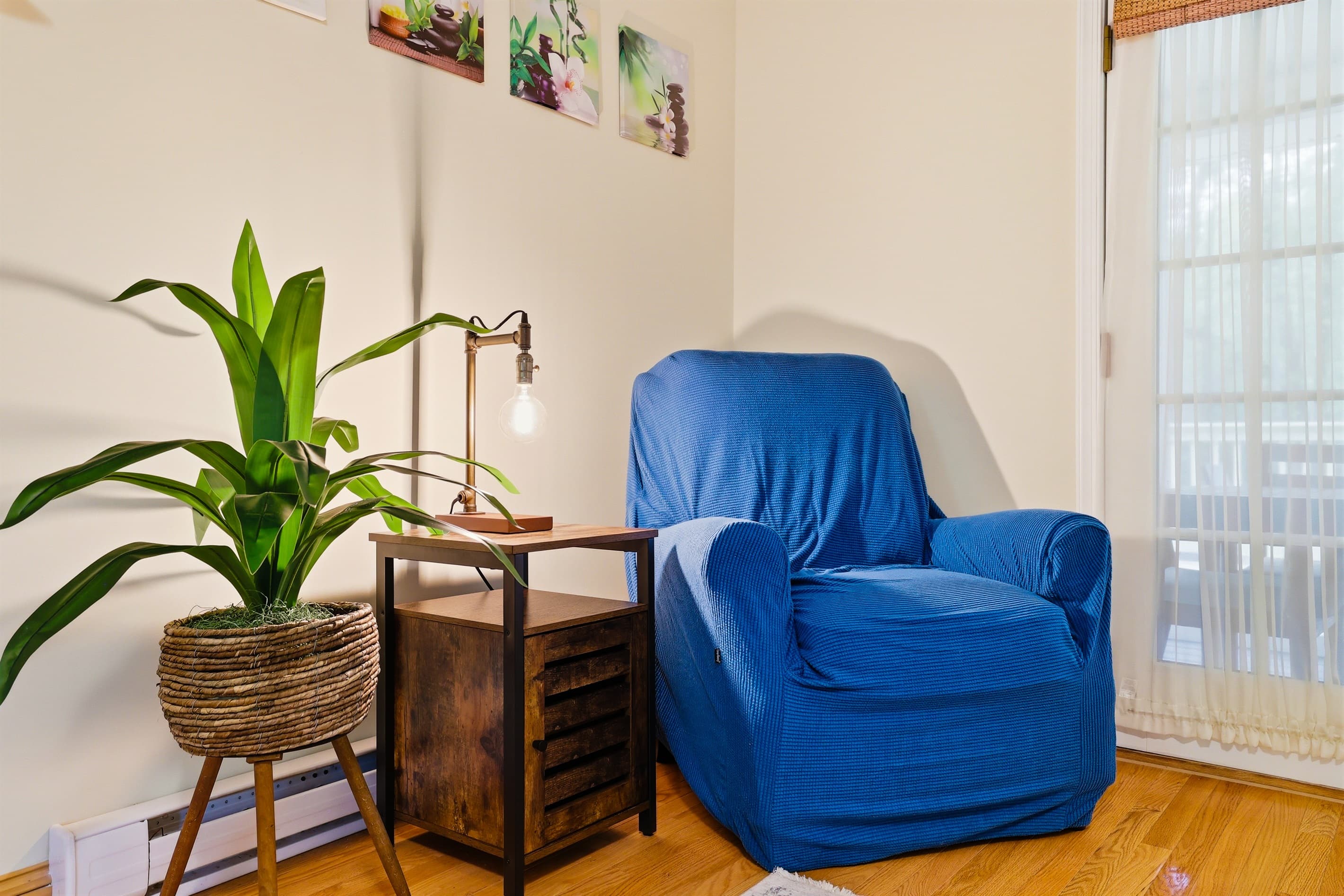 Living room with comfortable seating, propane fireplace and TV