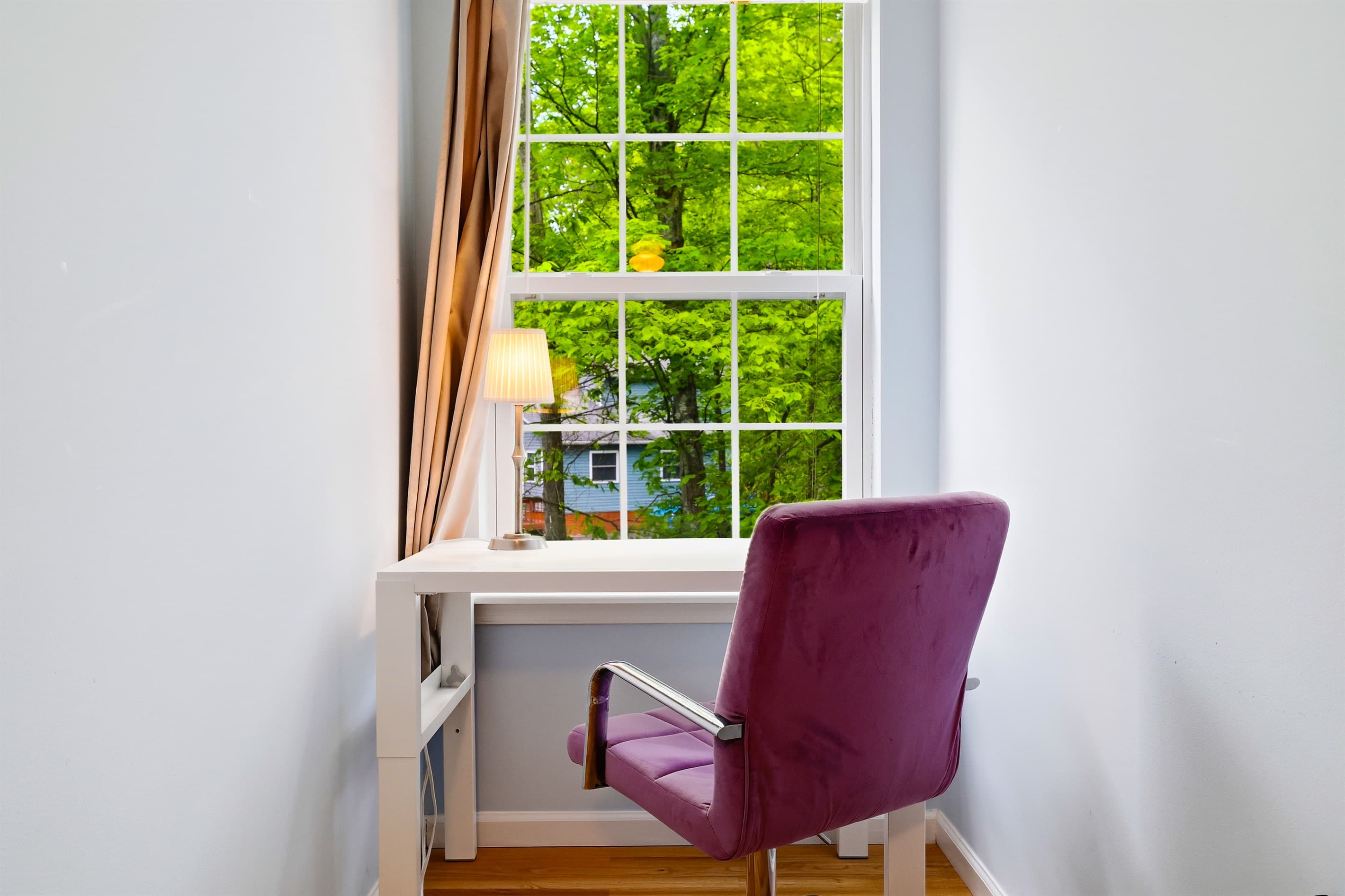 laptop workspace in bedroom