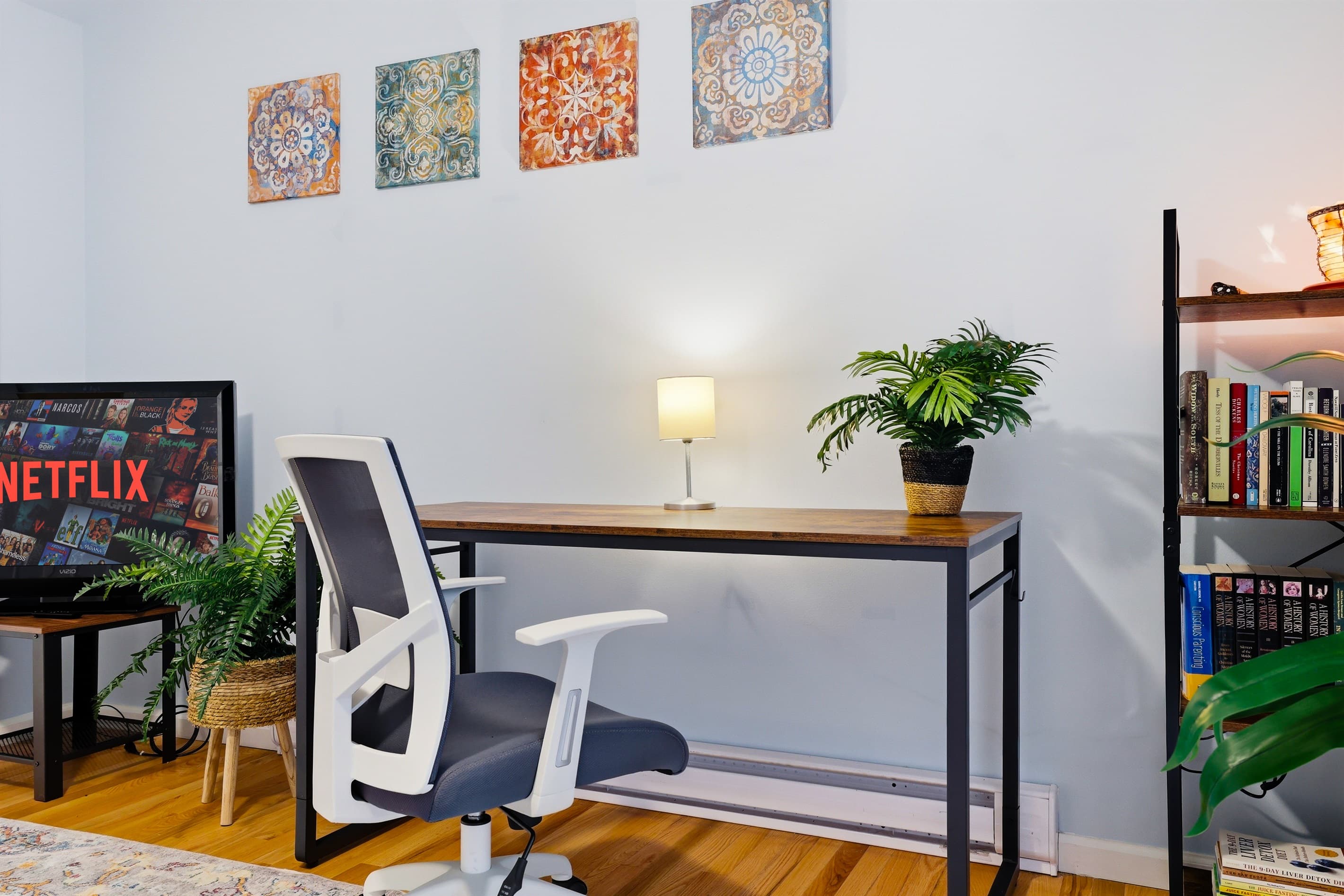 Bedroom with futon, TV and workspace