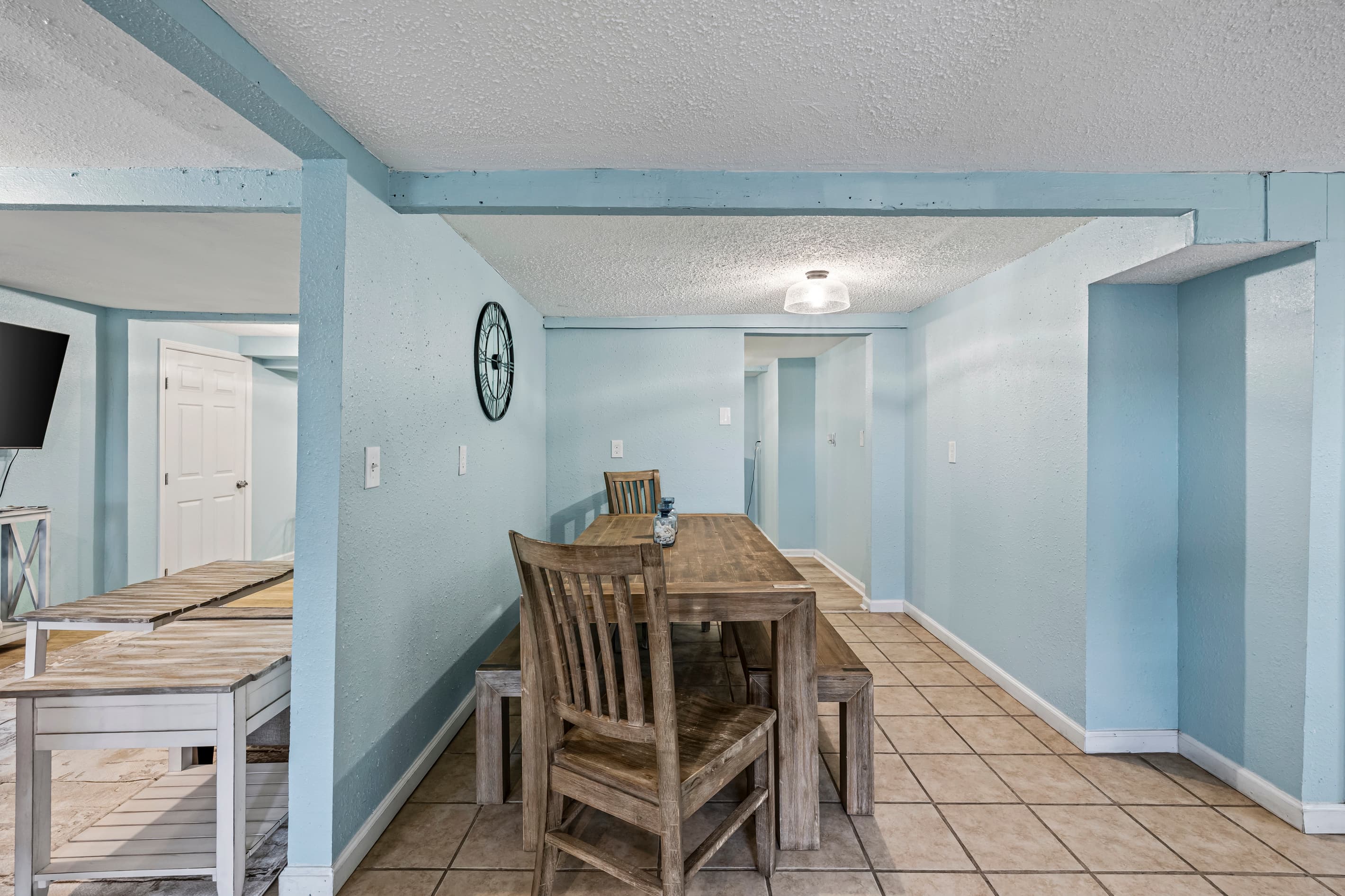 Full-size stove, refrigerator, and all the cooking essentials — the kitchen at the Historic Anchor at M is ready for everything from quick breakfasts to Gulf Coast dinners.