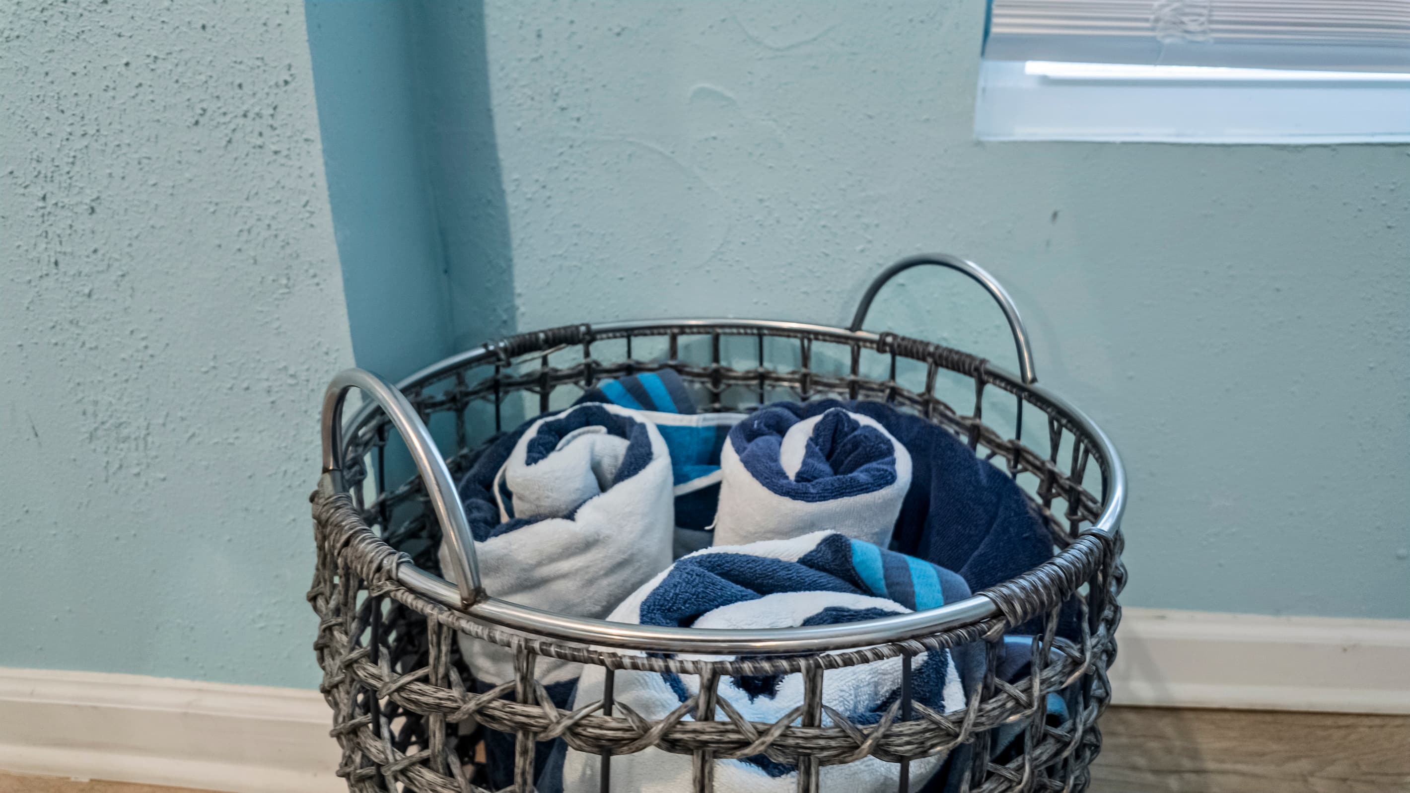 A well-lit vanity mirror and quality fixtures in the second bathroom — a functional and attractive space for your daily routine at the Historic Anchor at M.