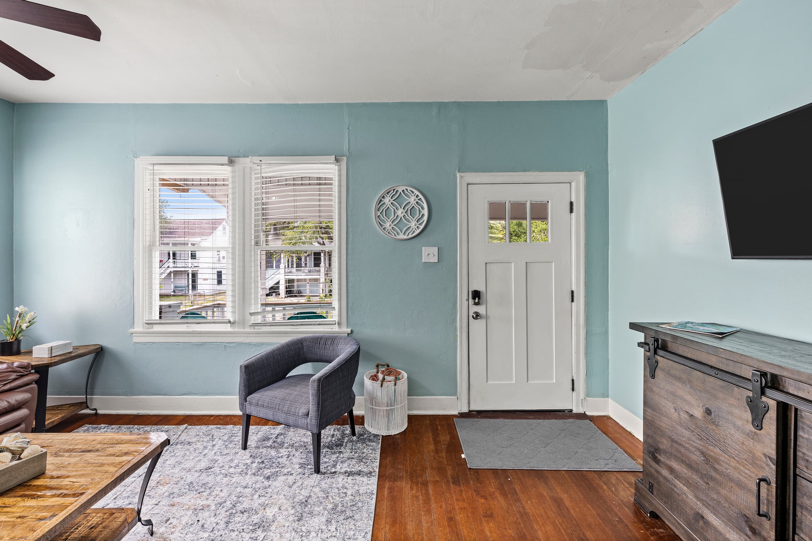 A fully equipped kitchen with rich dark cabinetry, granite countertops, and stainless steel appliances — ready for real meals or quick island snacks.