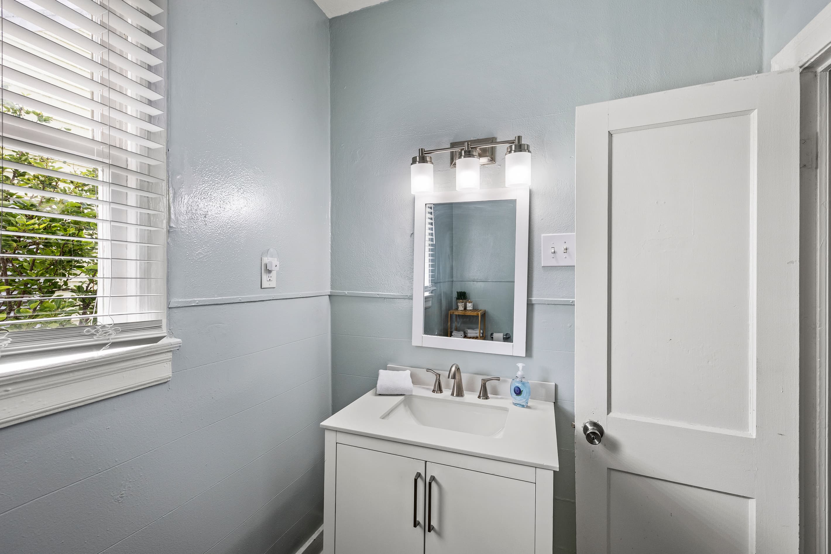 The full bathroom is well-appointed and generously sized — a comfortable retreat for the whole group to share without the rush.
