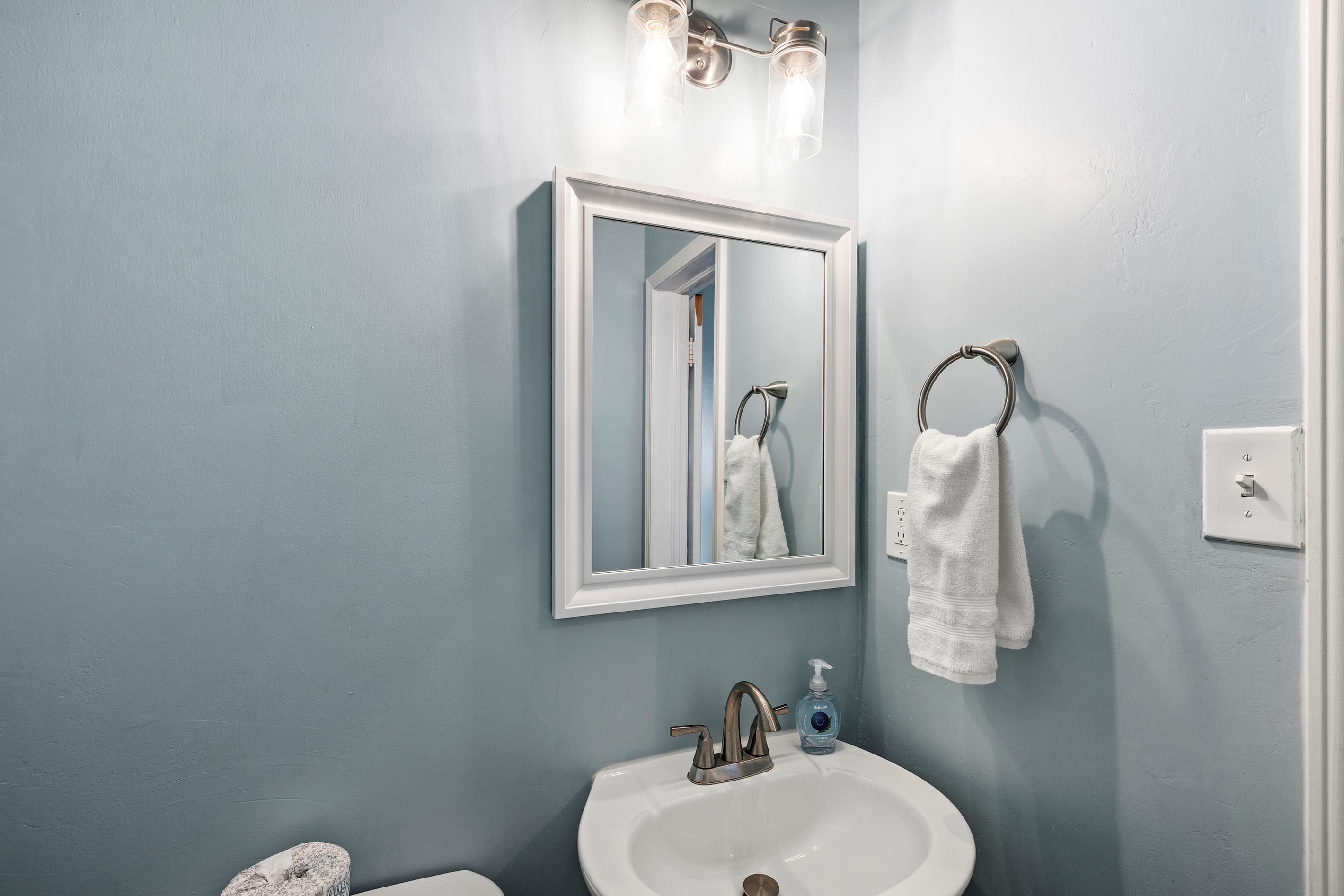 Fresh linens, quality fixtures, and clean lines throughout — the bathrooms at Top Right Avenue M are set up and ready from the moment you arrive.