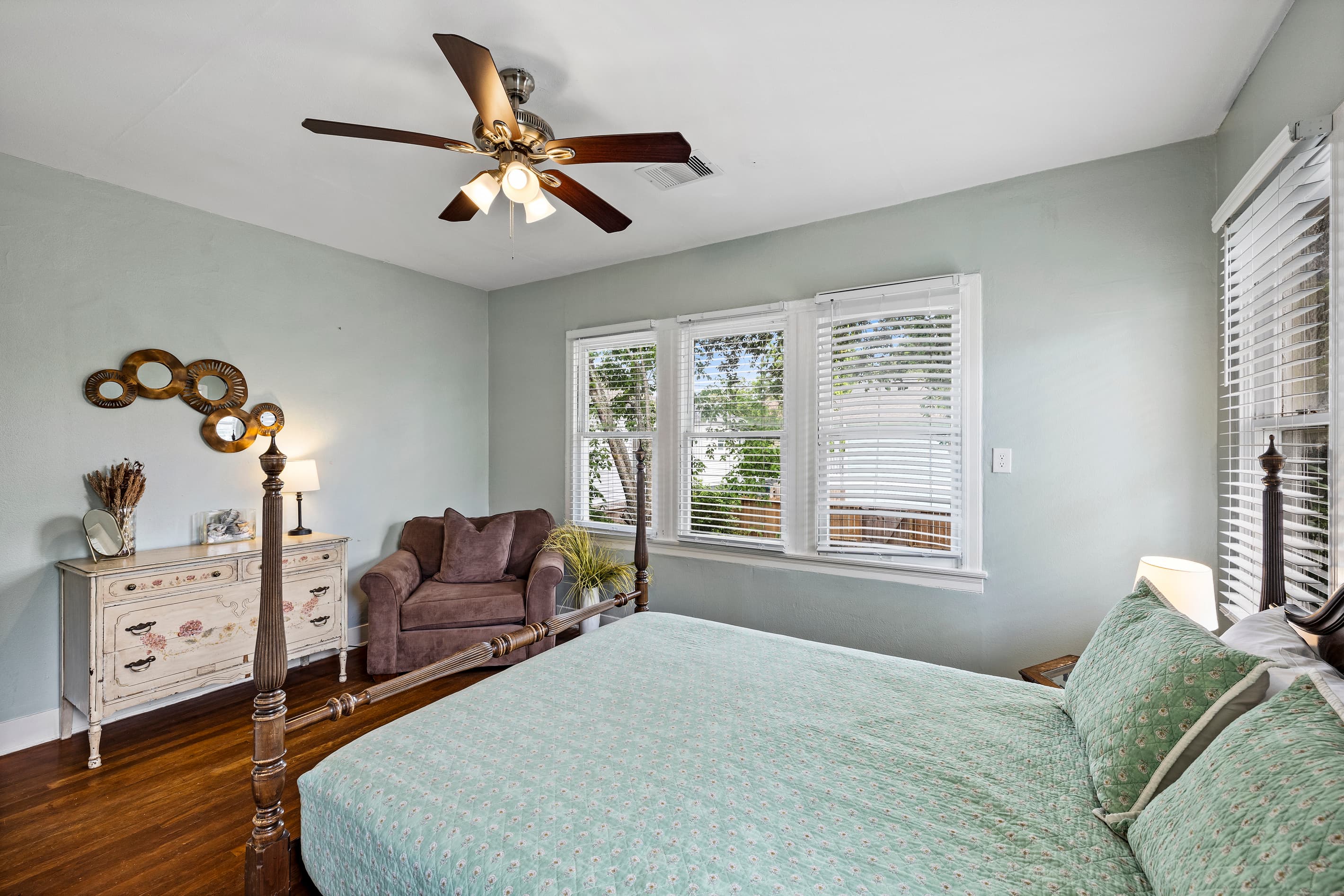 A ceiling fan keeps the air comfortable and sleep easy — the second bedroom at Starboard at M is quiet, restful, and ready for a great night's sleep.