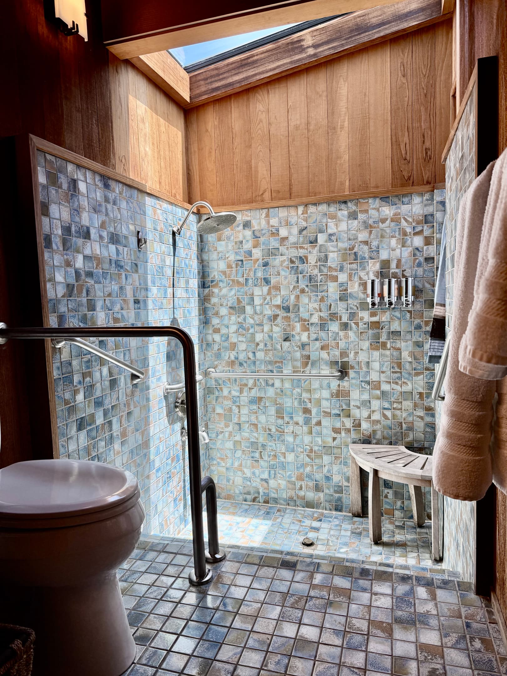 "Love the new safety bars in the shower. Made me feel as secure as a kid with their favorite blankie. It convinced me to put them in at home."
Accessibility and safety in the ensuite bathroom.