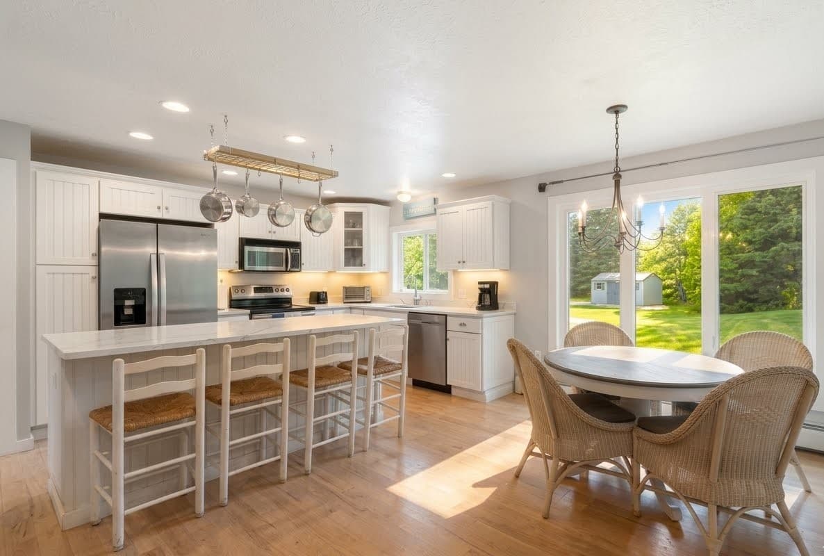 Large and open eat in kitchen with dining new stone counters updated in 2026