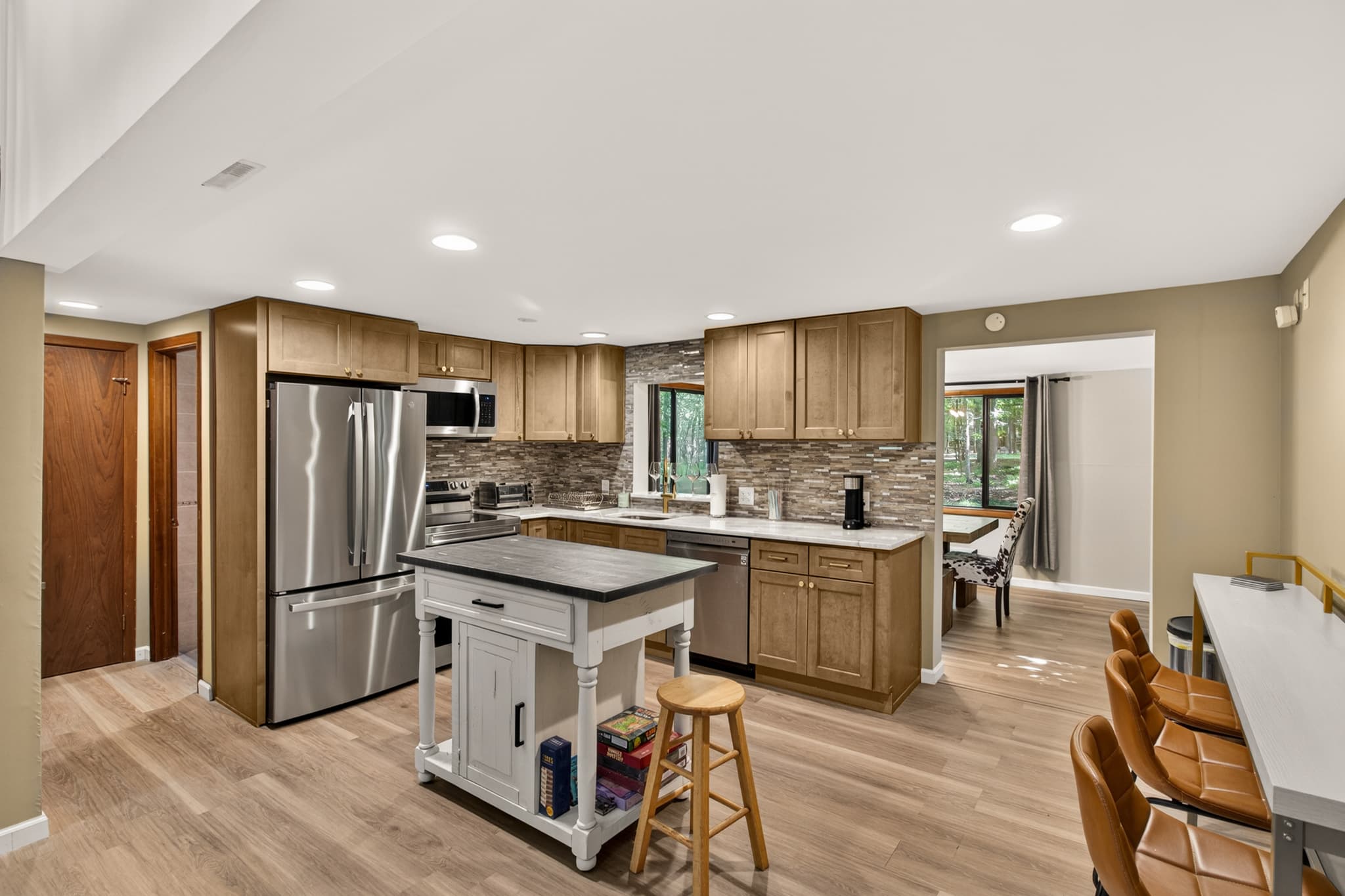 Kitchen with island and stainless steel appliances